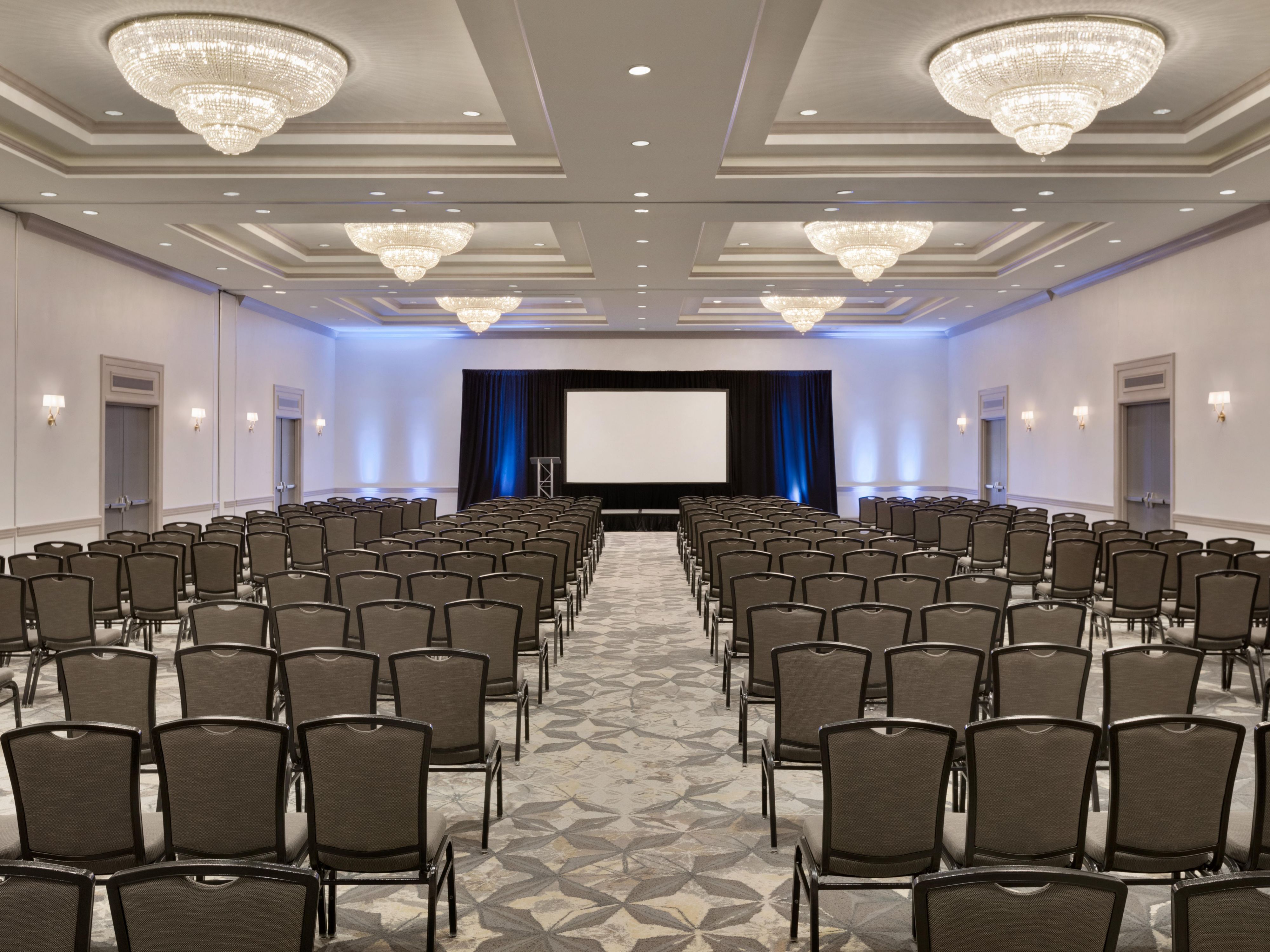 Whether you're hosting a luxurious wedding reception or a powerhouse business seminar, our hotel has the event space you need. With a separate event entrance, spacious conference rooms, two grand ballrooms and two large boardrooms, our customizable spaces accommodate up to 300 guests and are outfitted with state-of-the-art lighting and A/V systems.