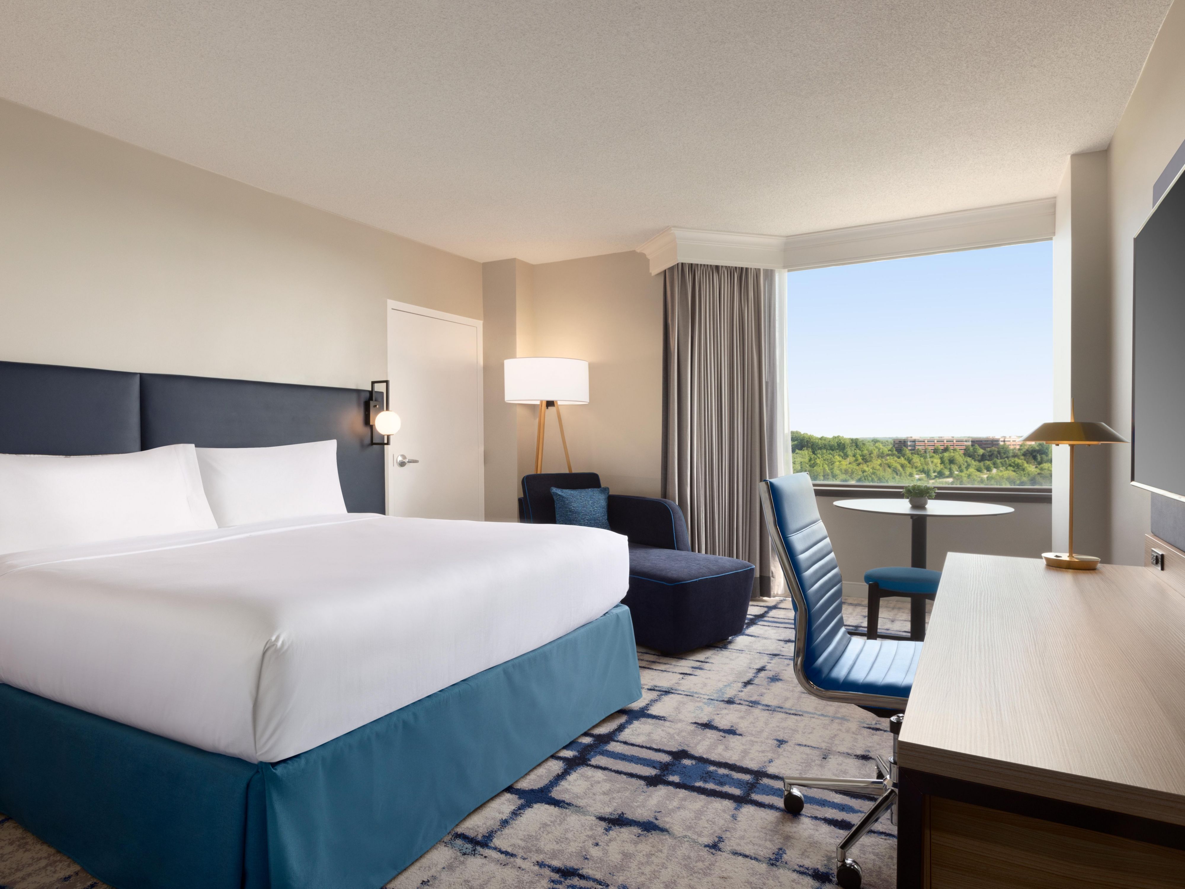 Unwind in our spacious King guest rooms with plush bedding.