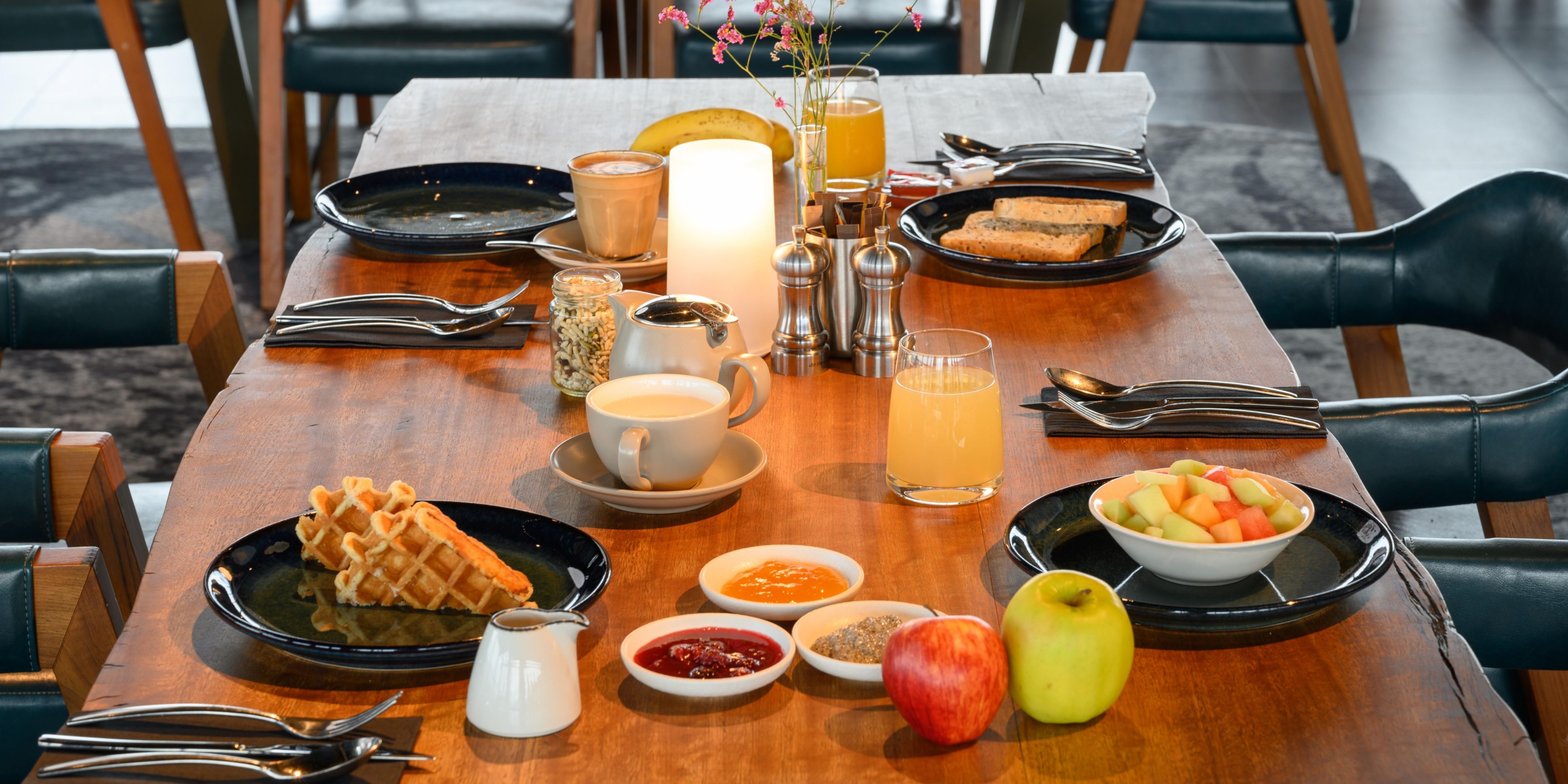 dining table with breakfast foods