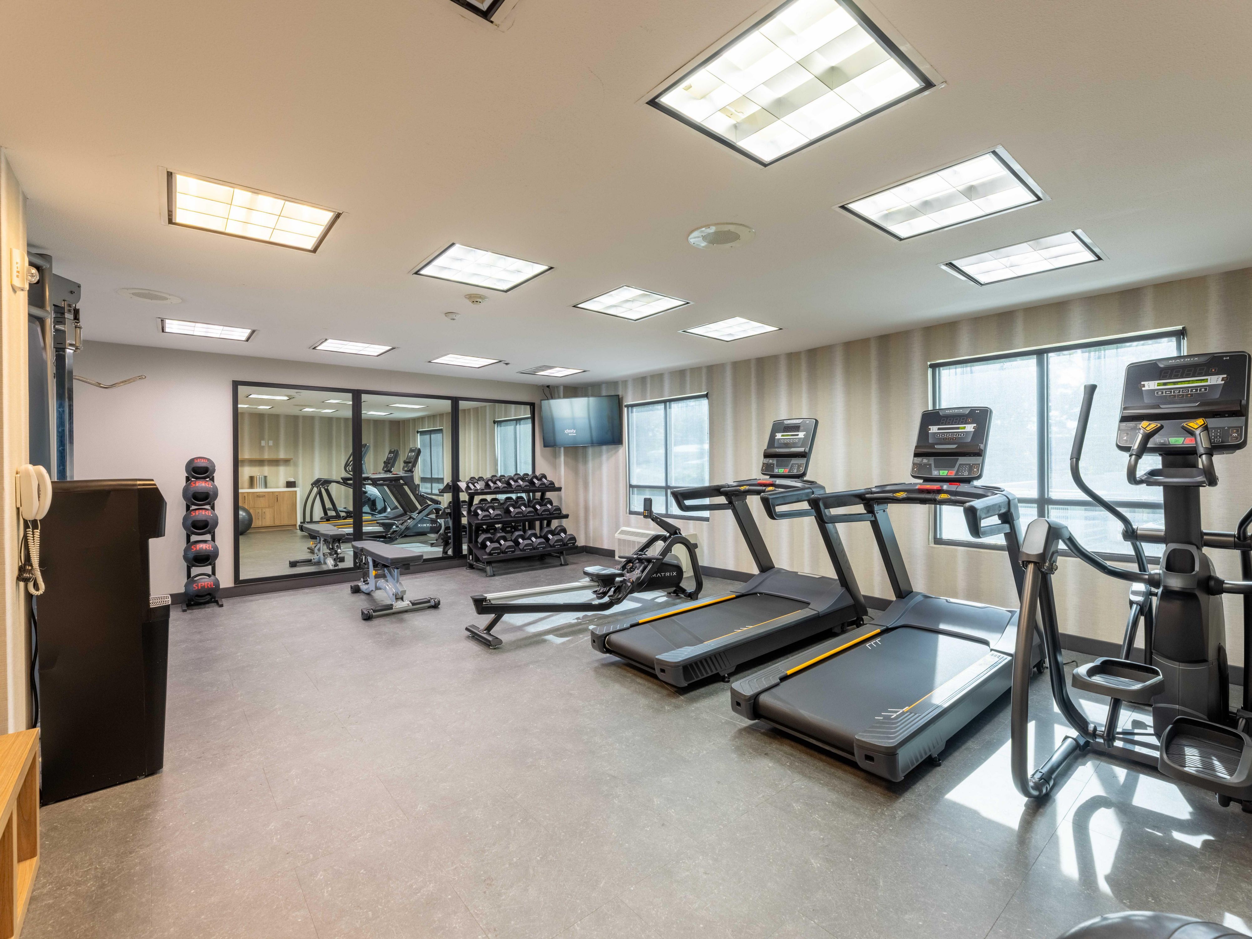 fitness center with cardio equipment