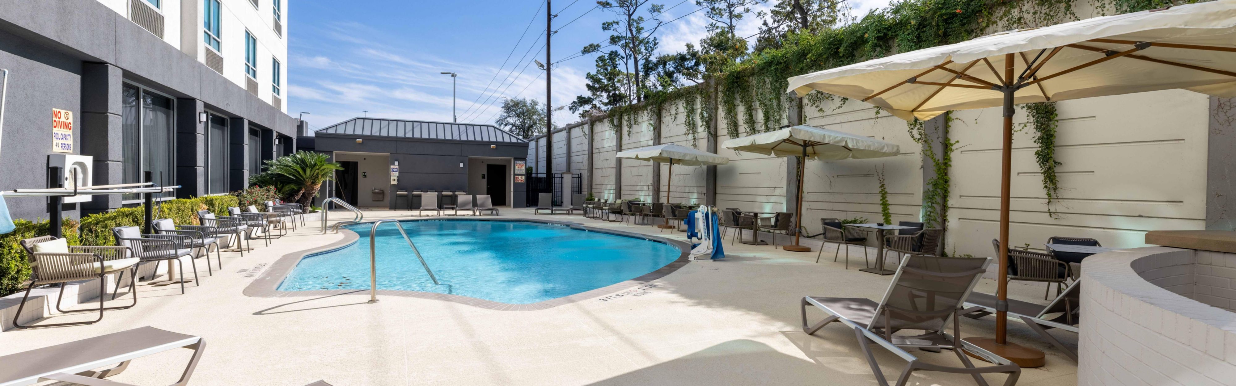 Outdoor pool with Sun Loungers