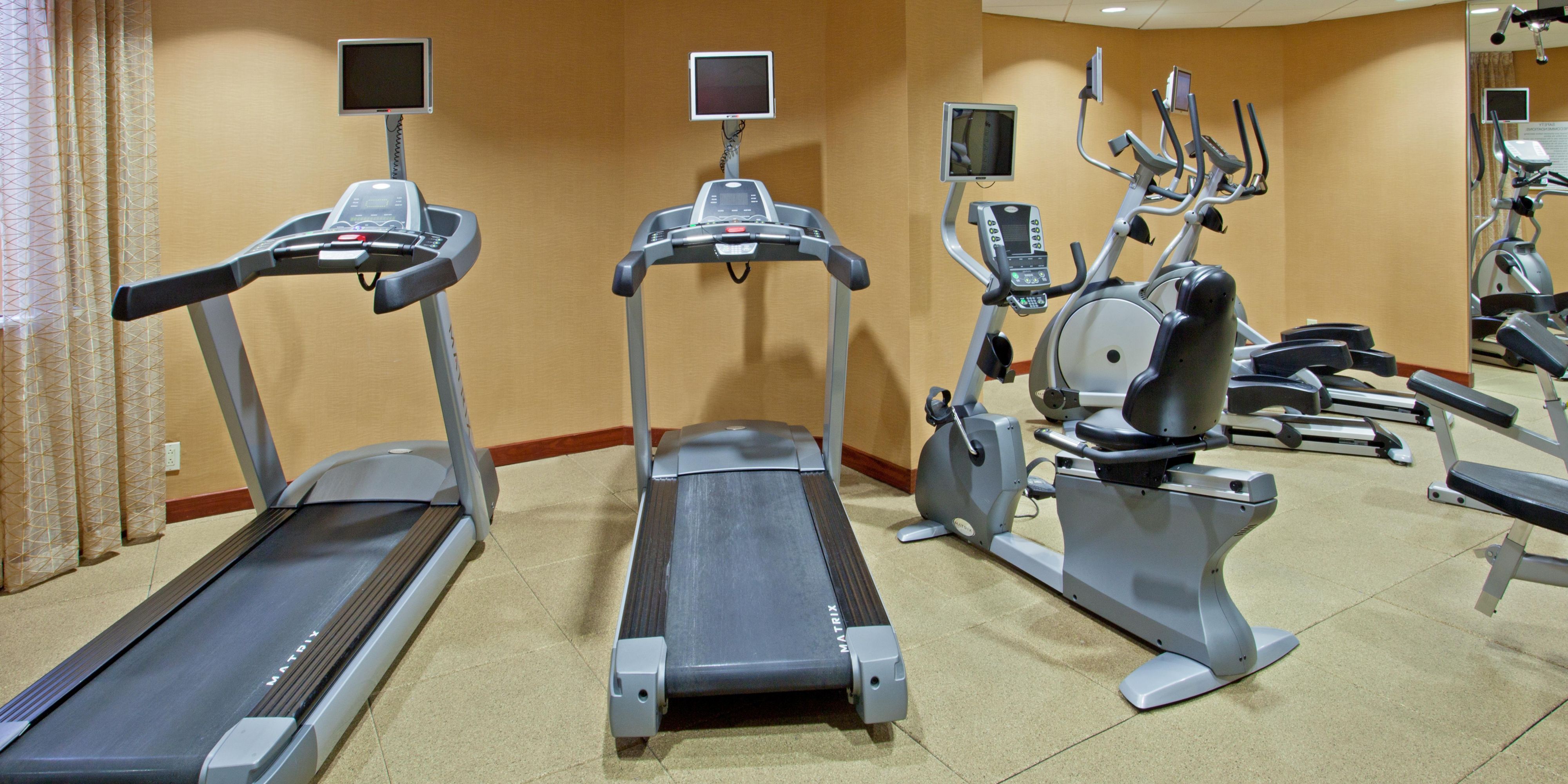 Energize your stay with fitness and wellness activities. Enjoy a workout in our Fitness Center with treadmills, stationary bikes, ellipticals, a workout bench, and free weights. Dive into our large outdoor pool or relax on the lounge chairs with umbrellas for shade. Play outdoors at nearby golf courses, walking trails, and tennis courts.