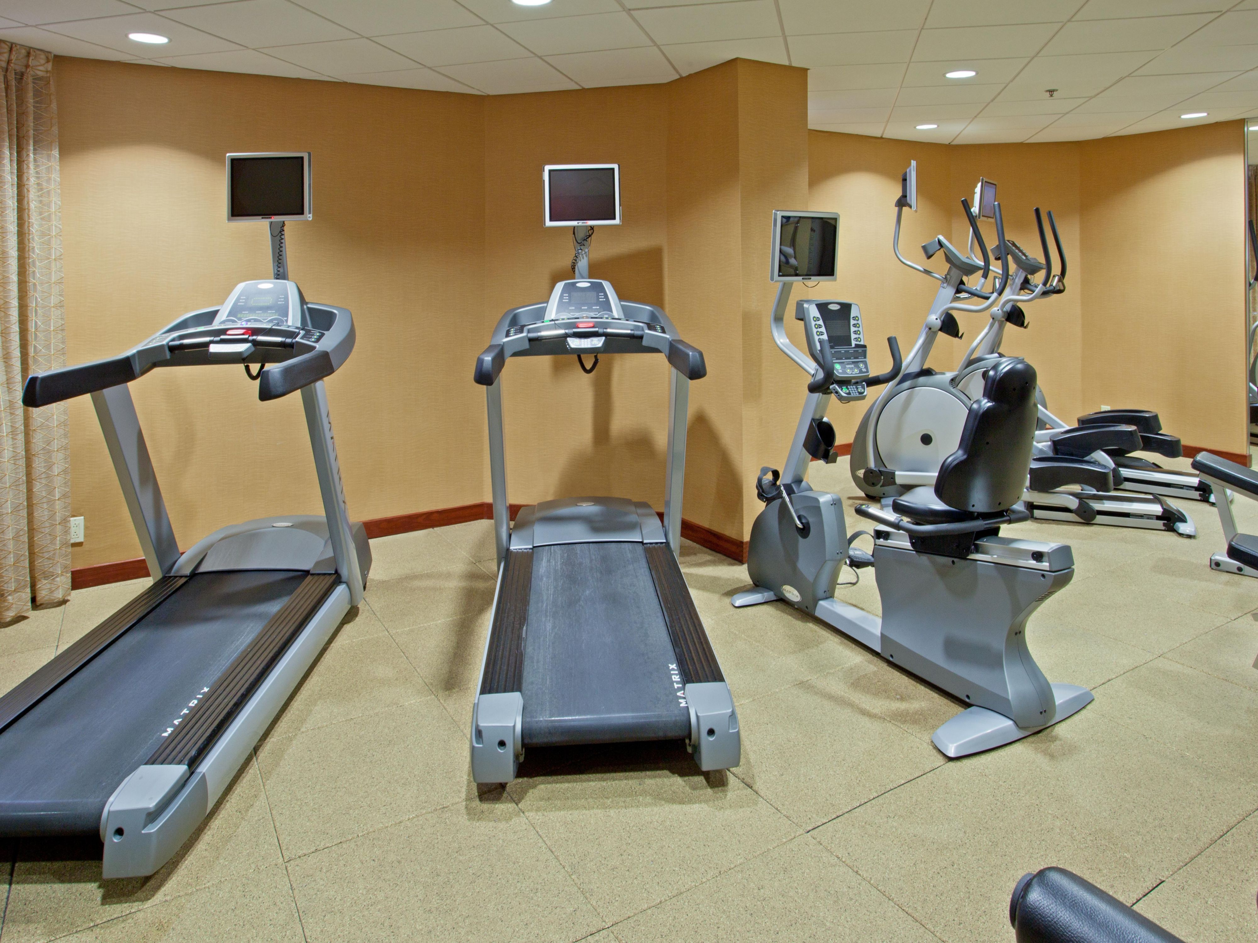 Energize your stay with fitness and wellness activities. Enjoy a workout in our Fitness Center with treadmills, stationary bikes, ellipticals, a workout bench, and free weights. Dive into our large outdoor pool or relax on the lounge chairs with umbrellas for shade. Play outdoors at nearby golf courses, walking trails, and tennis courts.