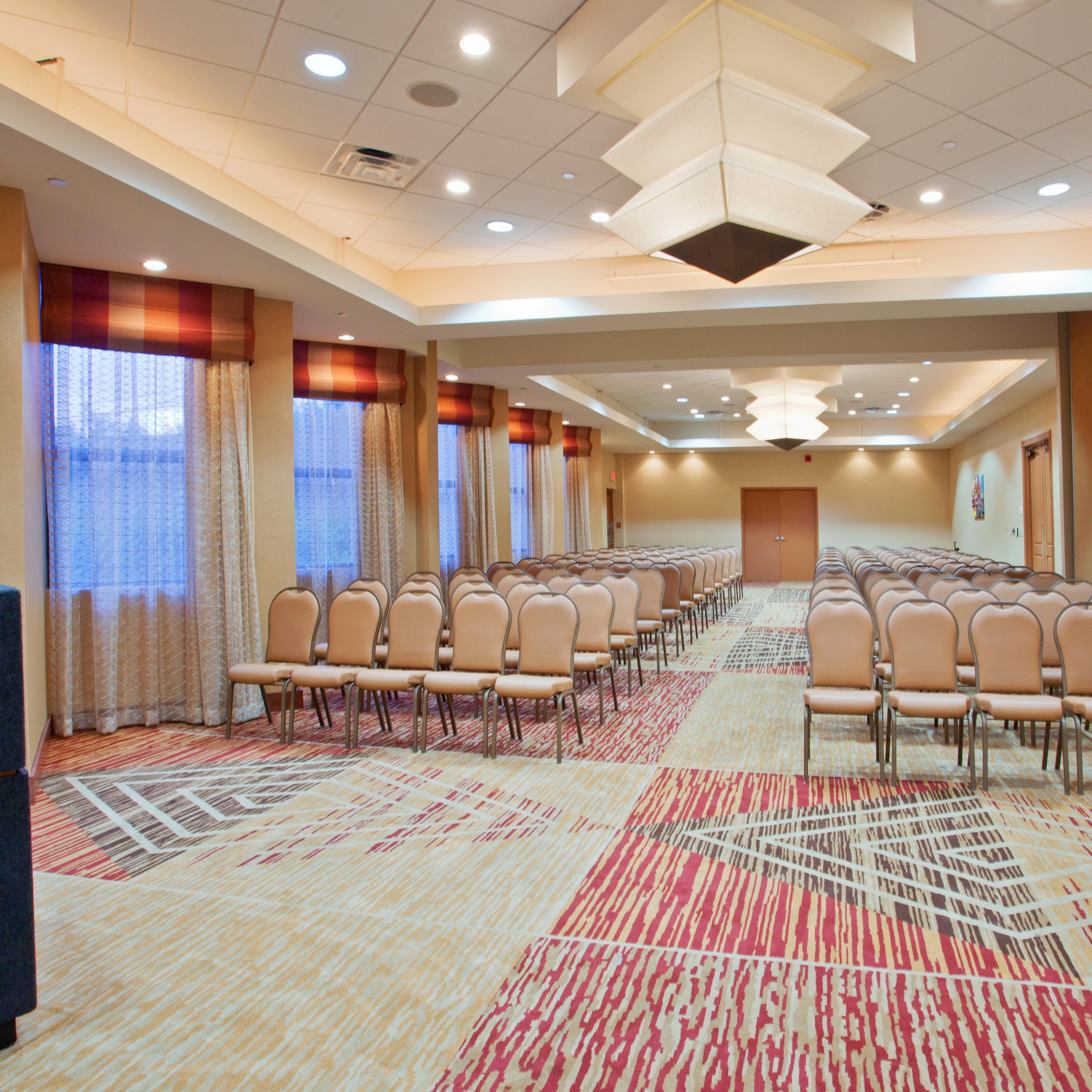 Our Houston meeting room features natural light and high ceilings.