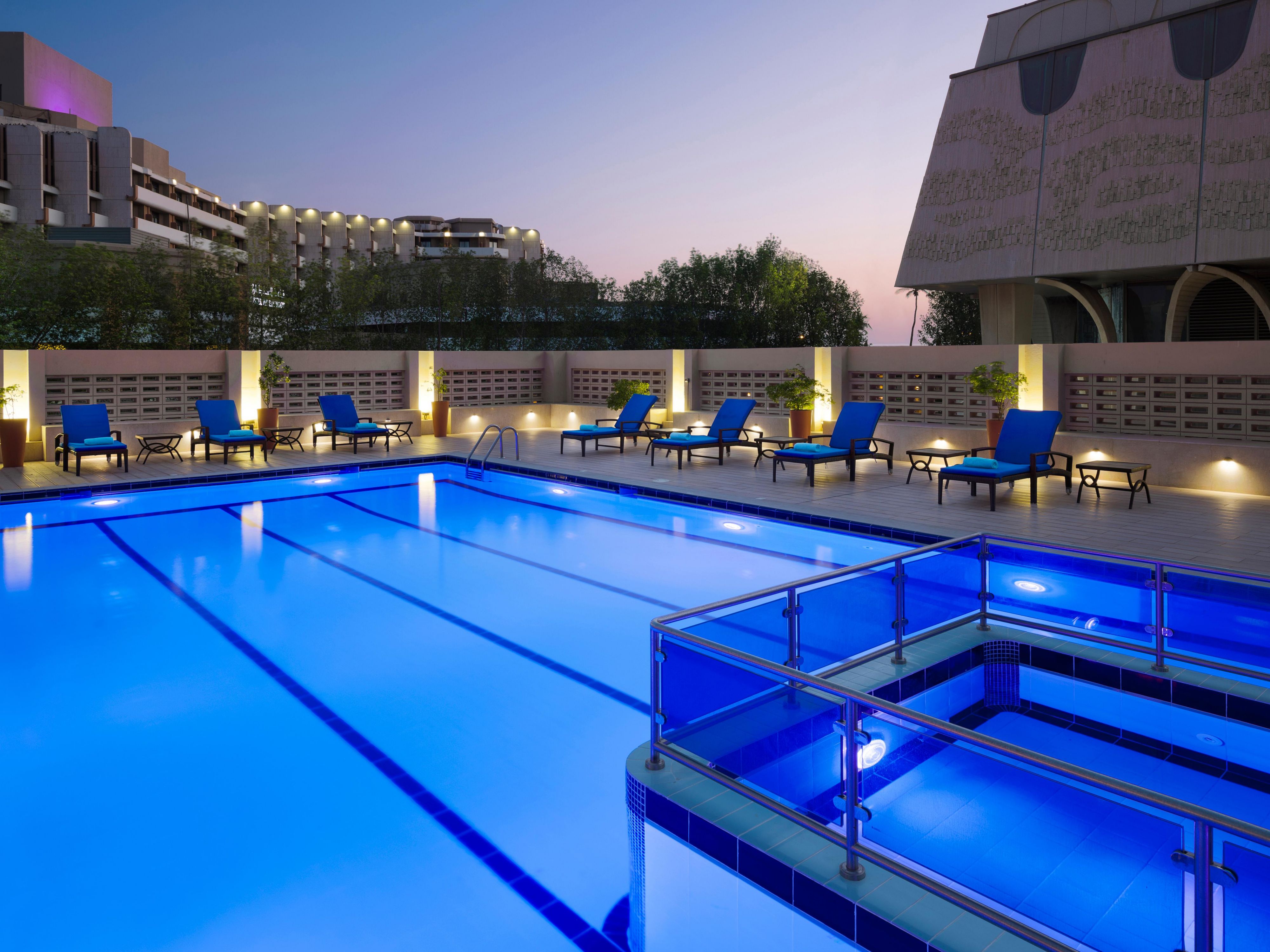 Unwind in the tranquil atmosphere of the Crowne Plaza Jeddah’s outdoor pool. Surrounded by lush landscapes, it offers a perfect spot for both relaxation and recreation. Whether you're swimming, lounging, or just soaking in the peaceful surroundings, the pool promises a refreshing escape. Its pristine waters and serene setting create an ideal place