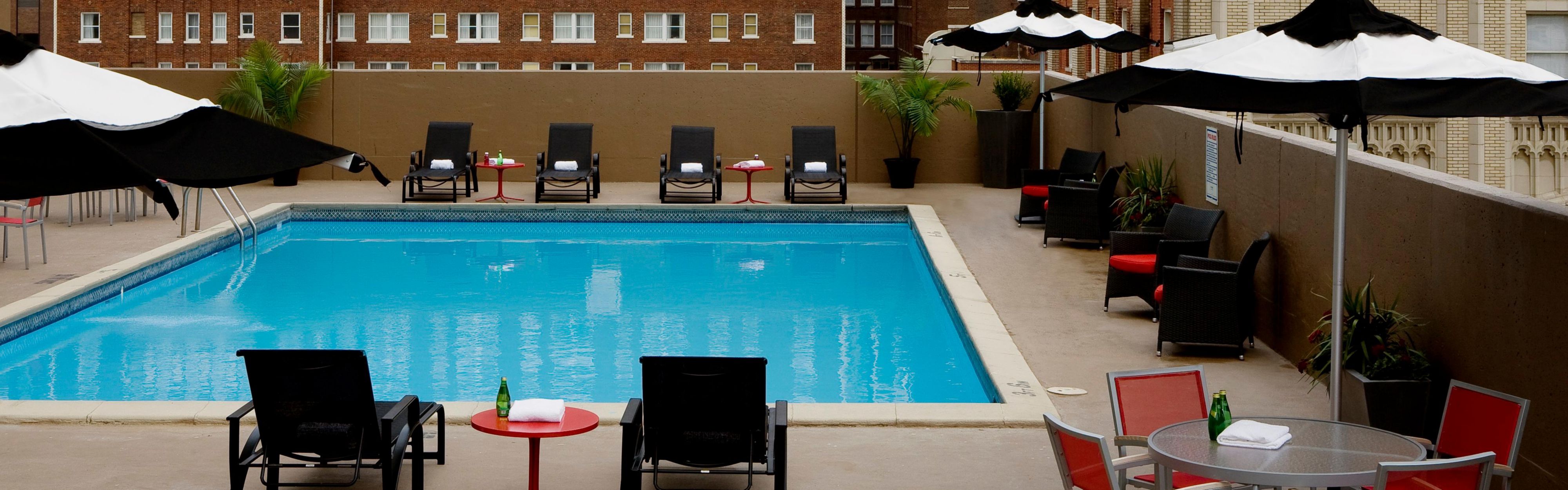 Enjoy views of downtown while you relax by our roof top pool