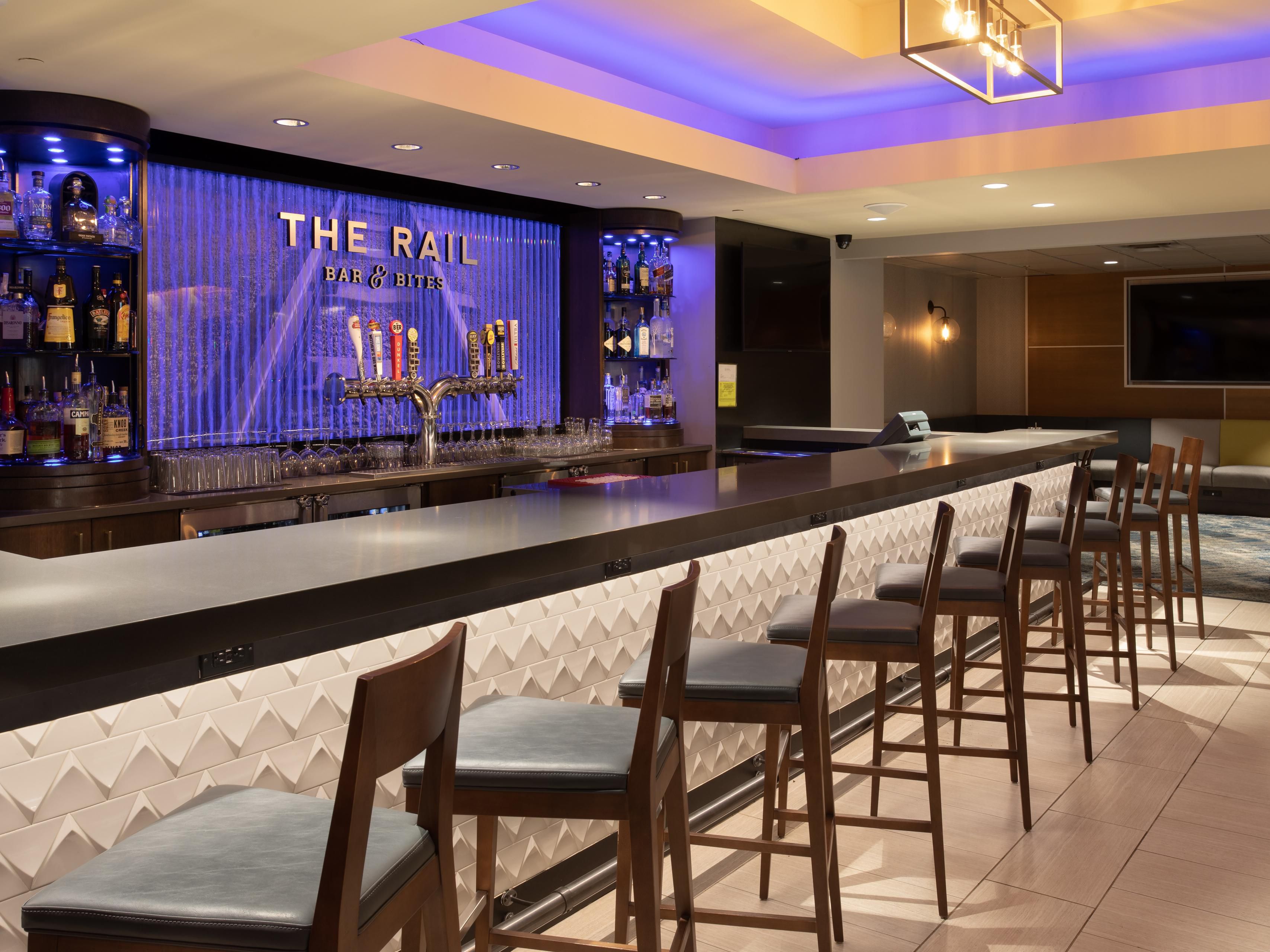 Located adjacent to the lobby, The Rail Bar & Bites is our newly redesigned bar and lounge serving up bold wines, creative cocktails, and local Kansas City brews. End your workday here with hand-crafted drinks and delicious appetizers as you catch up with colleagues or sip on craft beer with friends before venturing out into Kansas City. 
