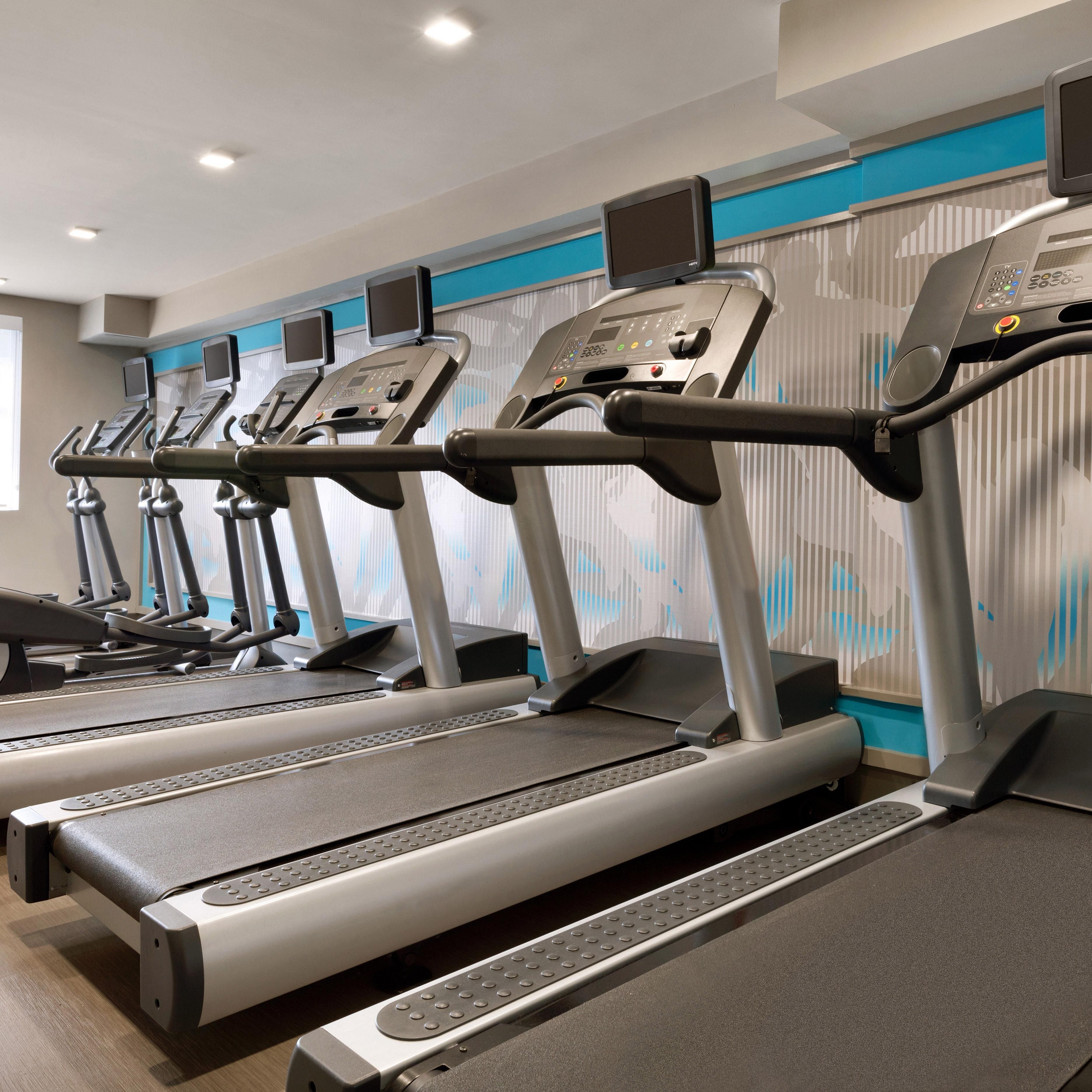 Our fitness center includes a variety of workout machines.