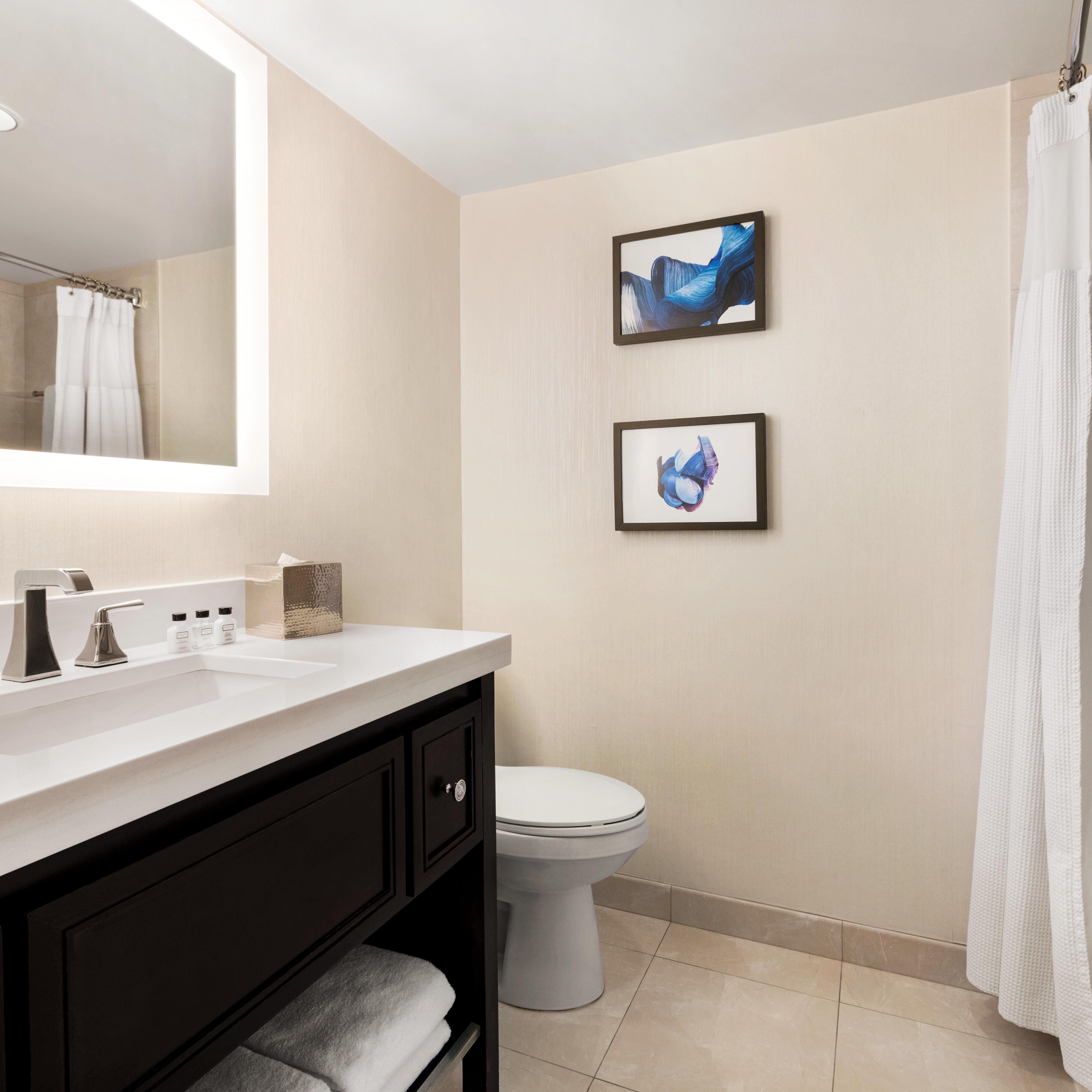 Mobility accessible bathroom with tub
