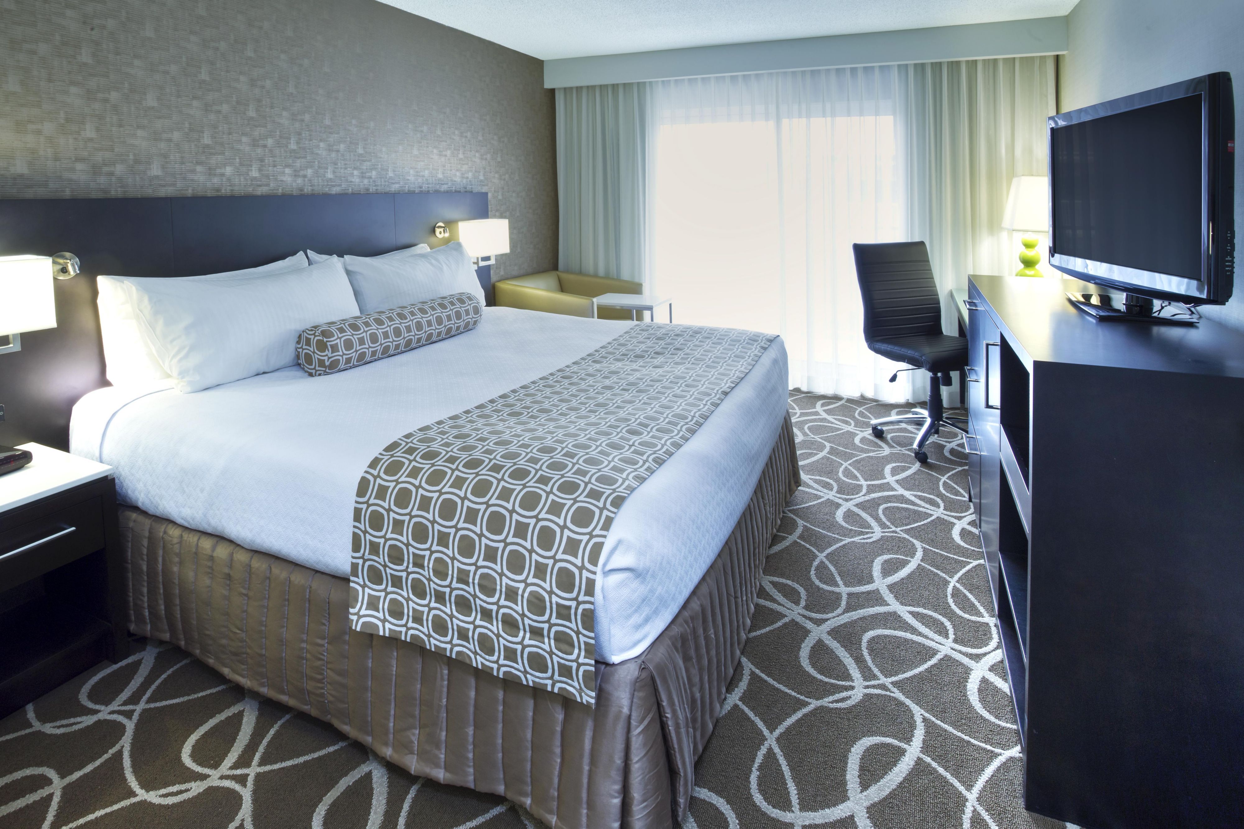 Unwind in your king room while you watch your favorite TV show.