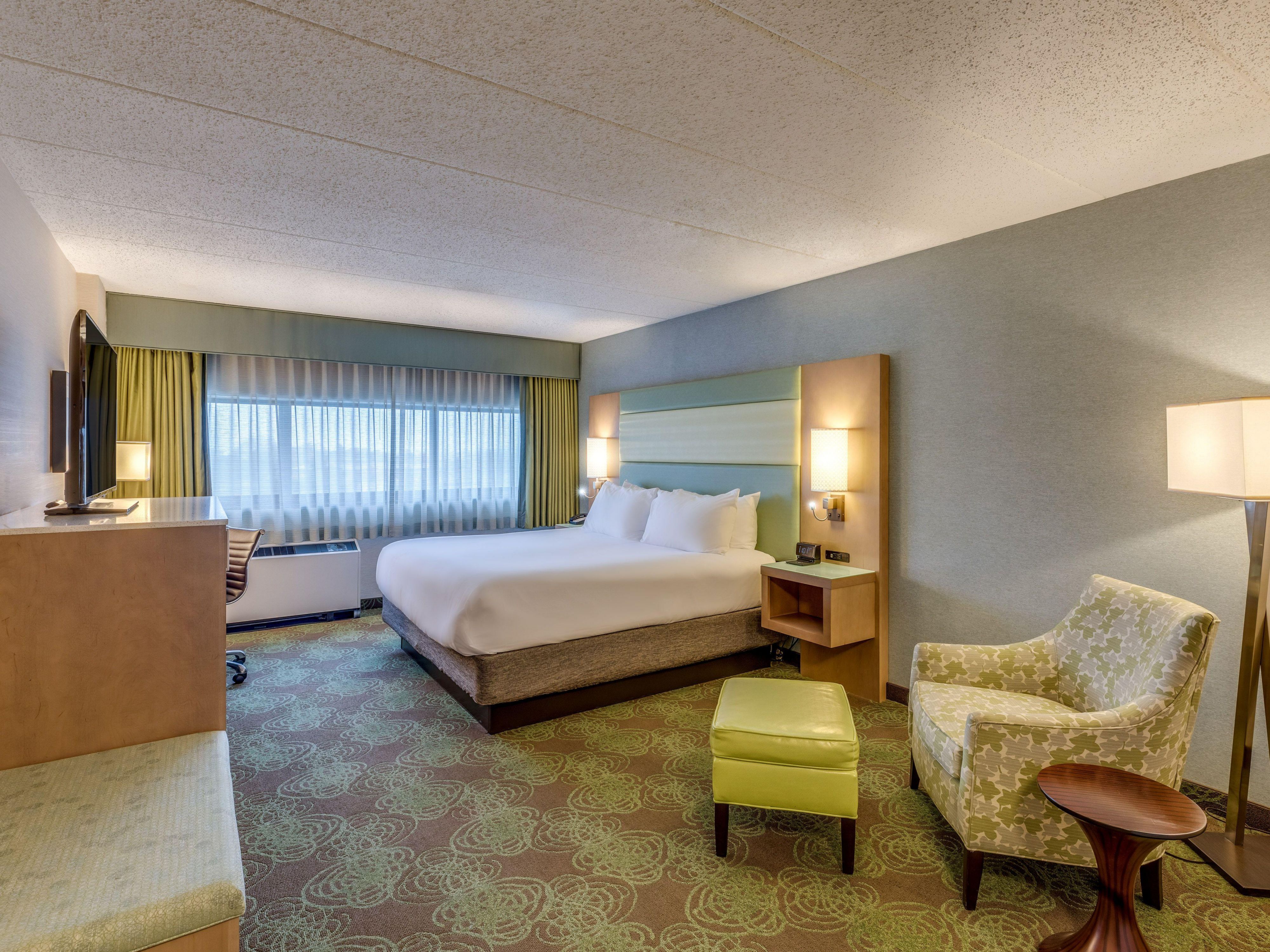 Relax in our clean, comfortable guest rooms designed with your comfort in mind. Whether you’re here for business or leisure, you’ll appreciate the thoughtful amenities and cozy atmosphere that make our rooms a restful retreat after a busy day exploring Lansing or attending meetings.