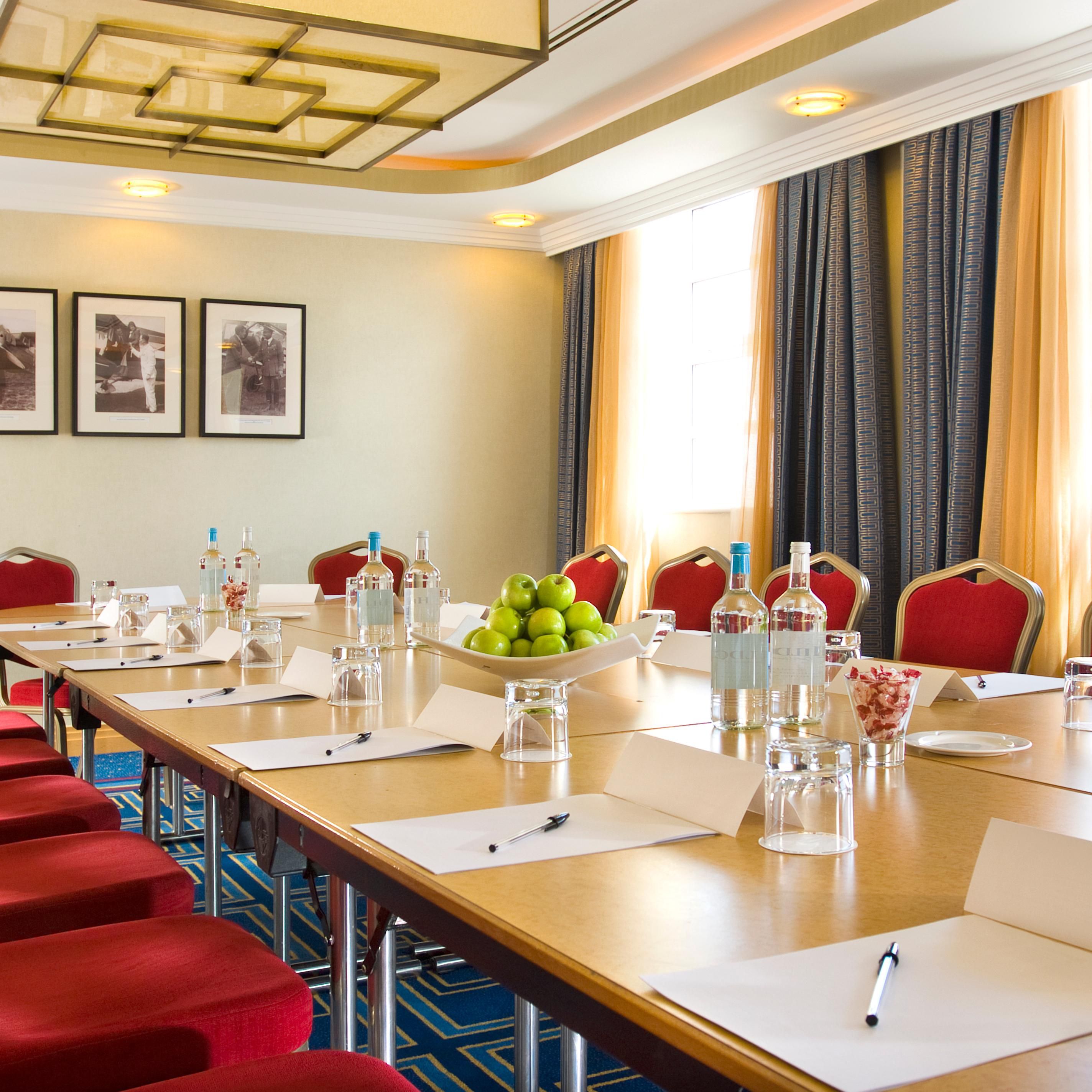 One of our 12 meeting rooms shown as Boardroom style