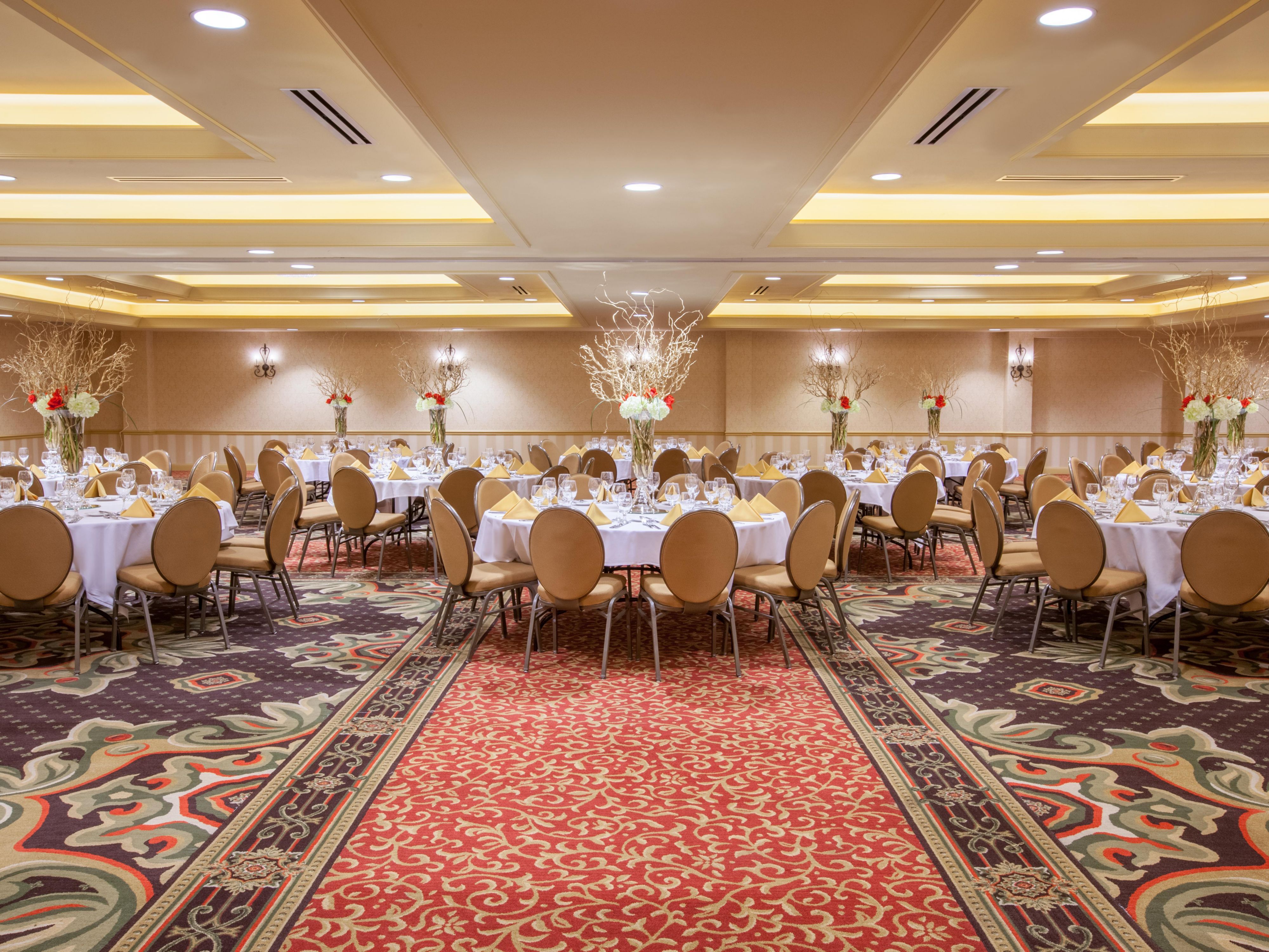 Wedding event space with decorated circular tables 
