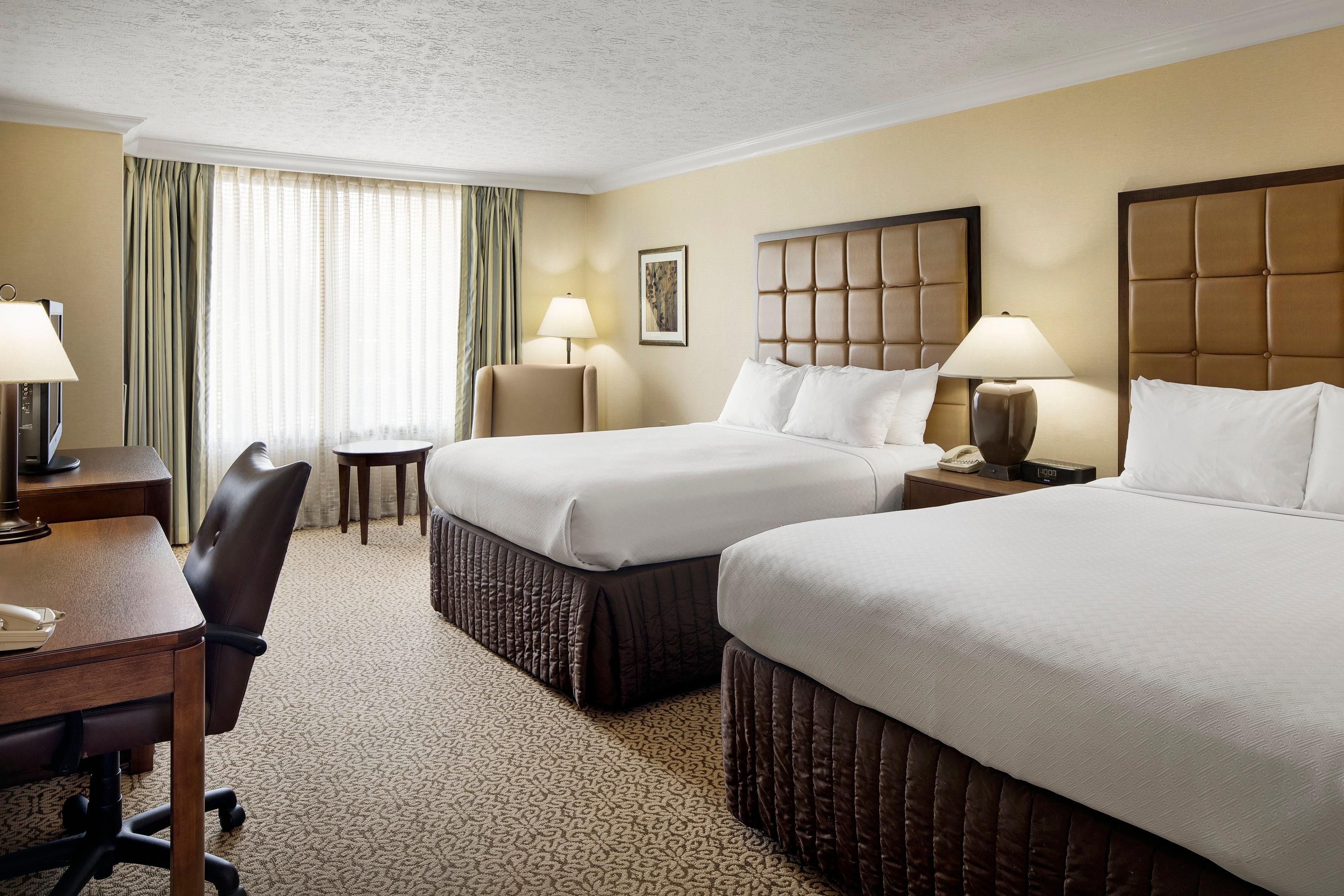 Spacious guest room with two queen beds 