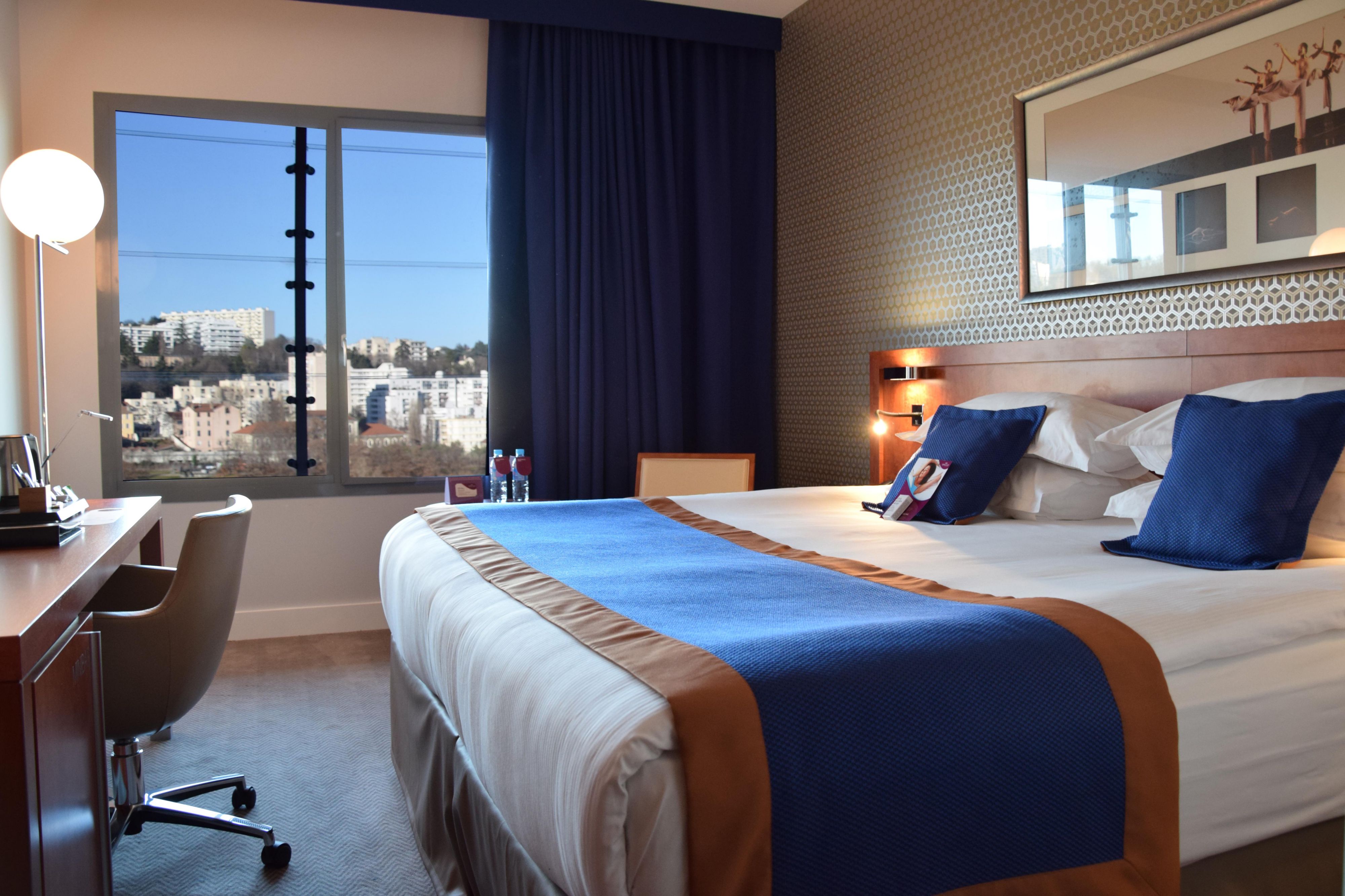 Beautiful light in superior room with view on the river Rhône