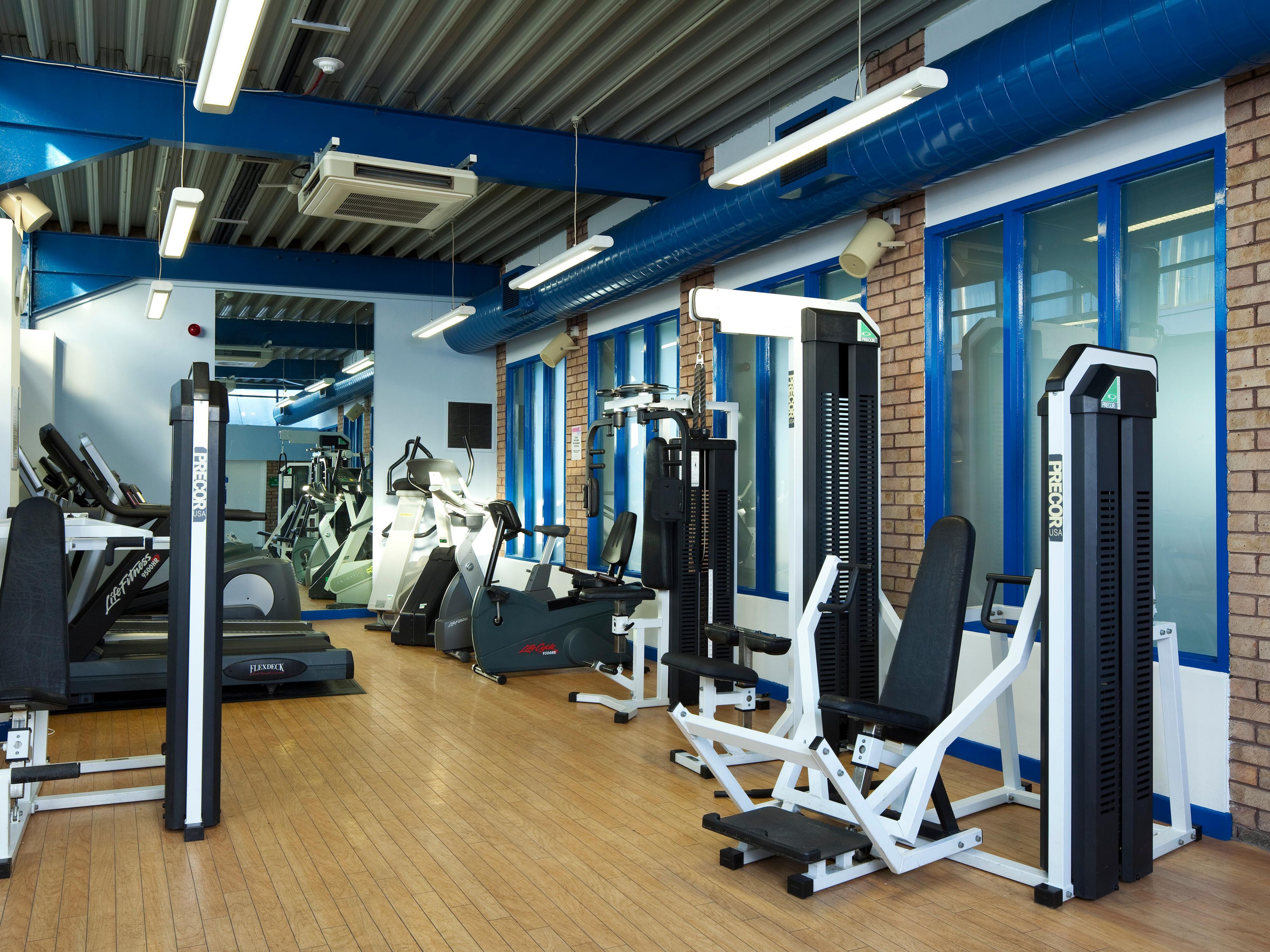 Compact gym with cardio and weight equipment.  Complimentary access for all hotel residents. 