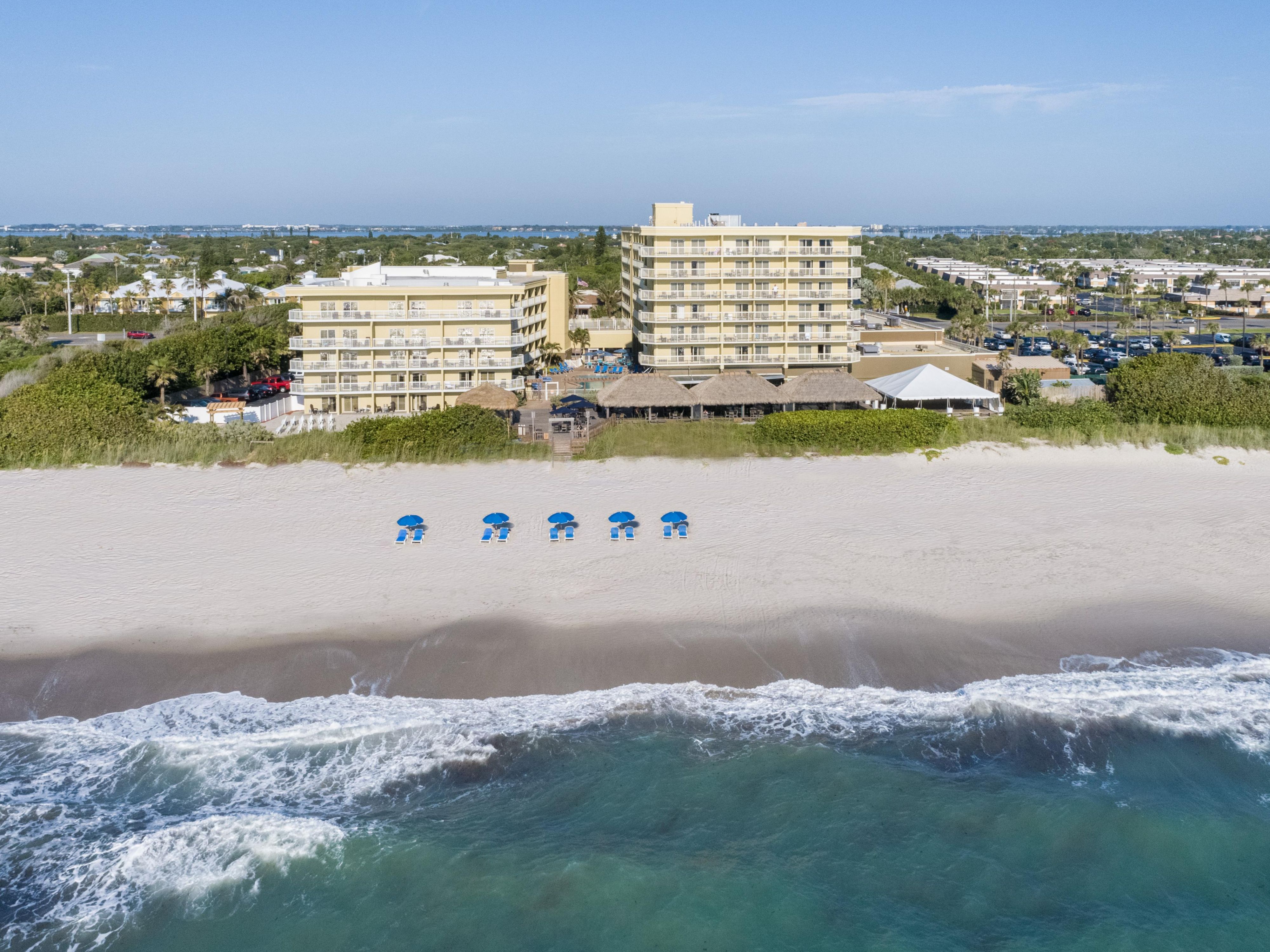Our sophisticated beachfront hotel is a relaxing oasis, providing guests with well-appointed rooms and fantastic amenities. Each room features plush bedding, a spa-inspired bathroom, and free Wi-Fi. All suites are oceanfront with balconies, allowing you to wake up and instantly greet the Atlantic Ocean, which makes this Melbourne FL hotel unique!

