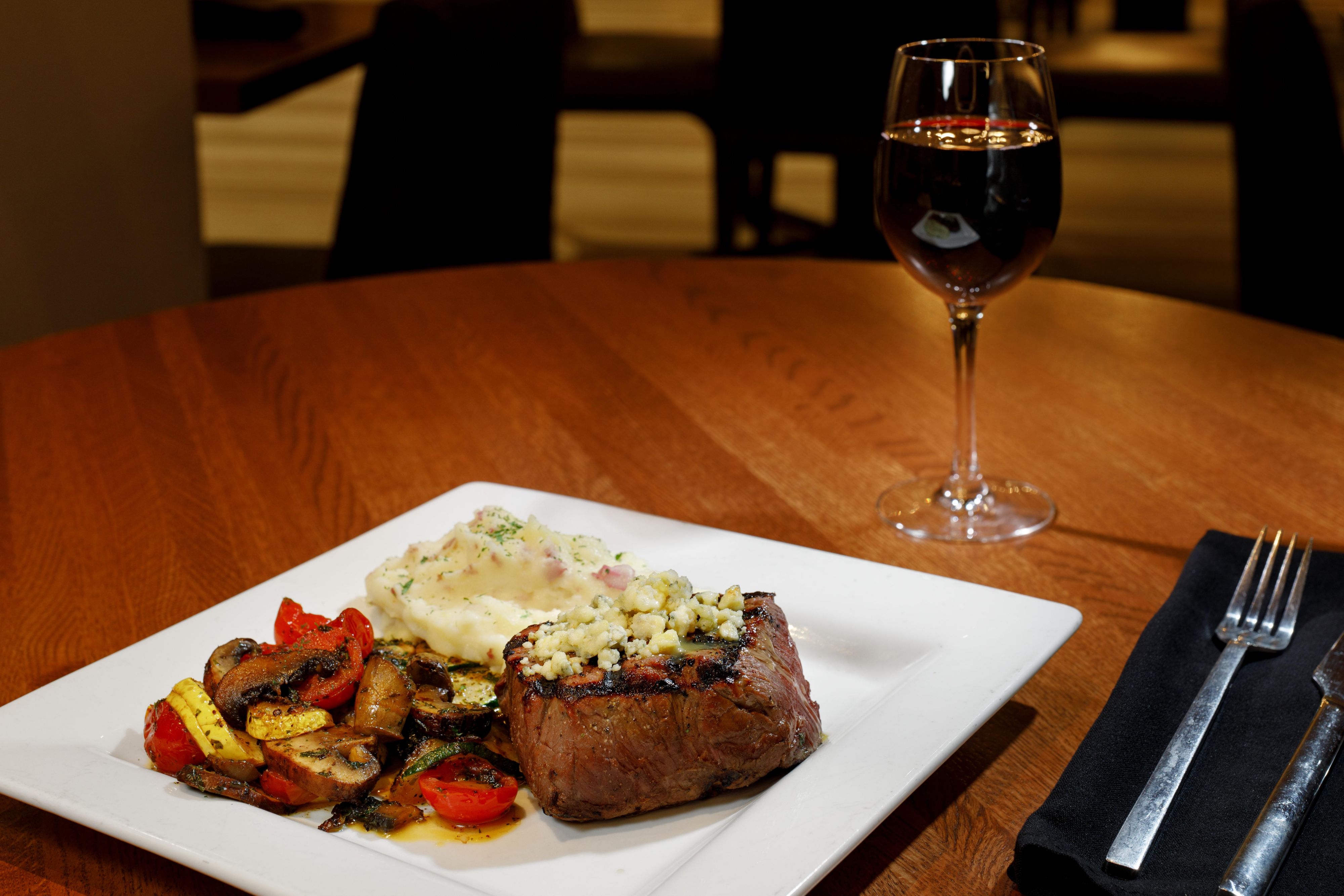 Relax with dinner and a glass of wine after a day of travel
