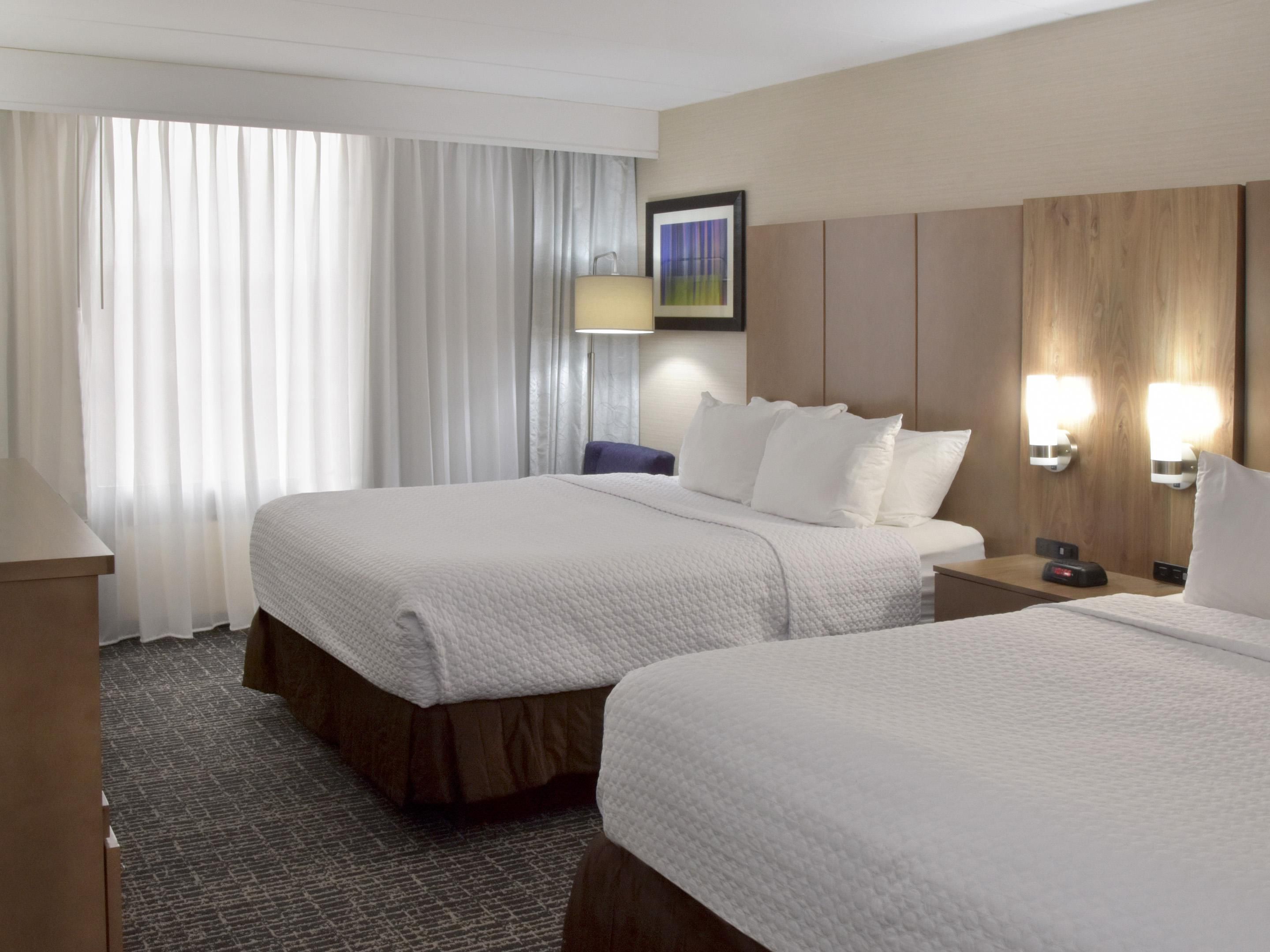 Two Queen Beds sleep up to 4 people.  Great for families & teams!
