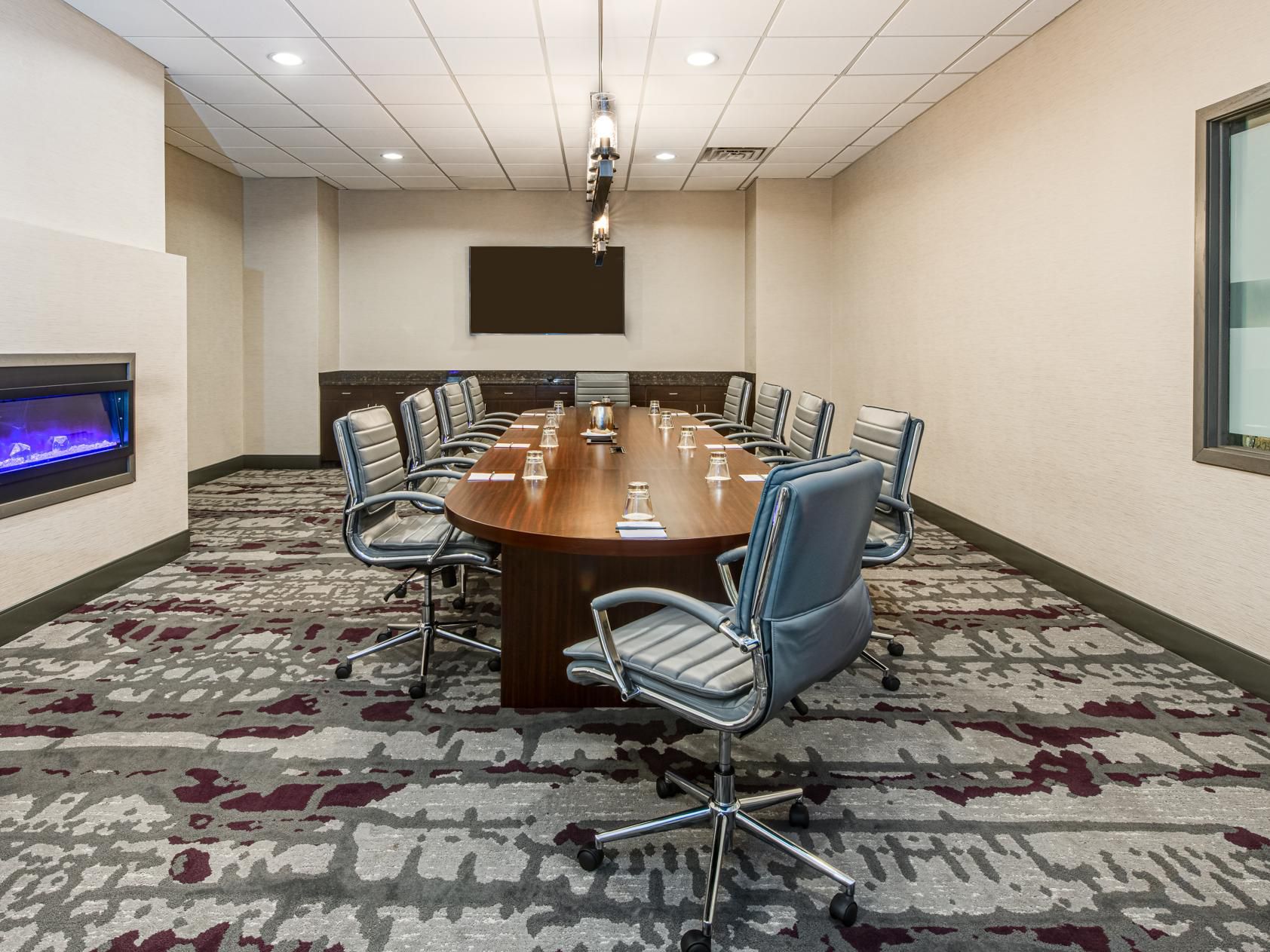 Boardroom meeting room with conference table 