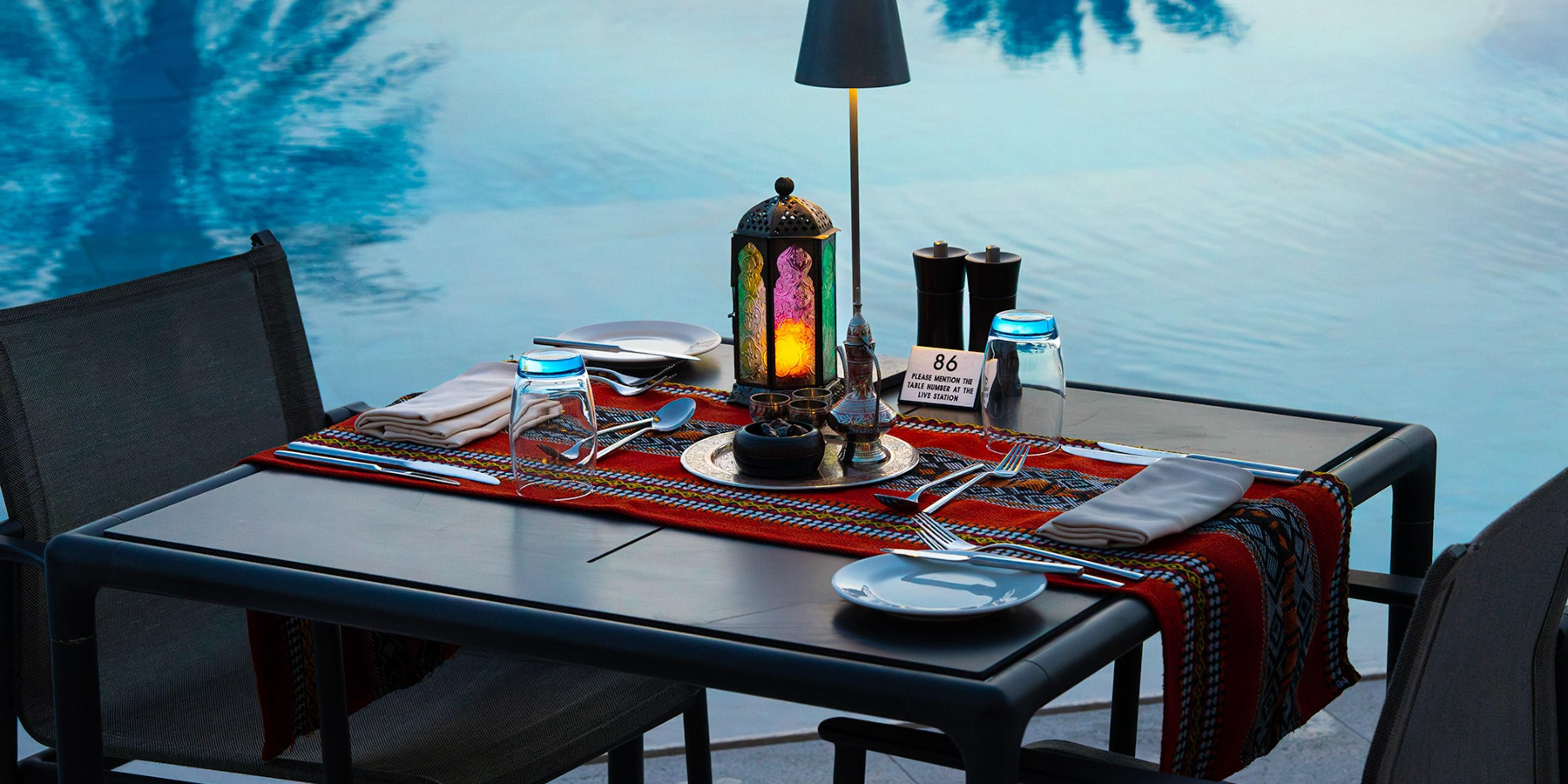 Experience a delightful Iftar journey with loved ones, savoring age-old recipes, live cooking stations, traditional sweets, and breathtaking views. Enjoy all of this for OMR 20++ including Ramadan juices. Available from Maghrib prayer until 22:00. To book your table, call us on +968 9508 7517. Terms and Conditions apply.