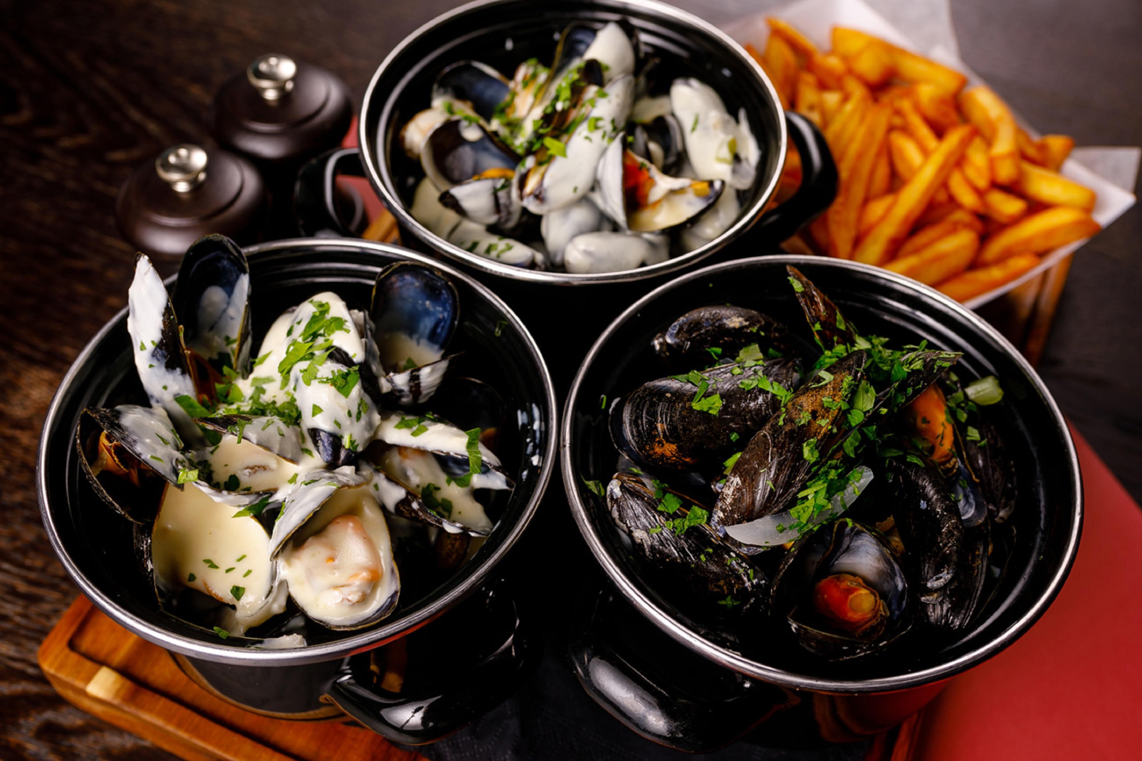 Taste the amazingly fresh mussels at Le Petit Belge.