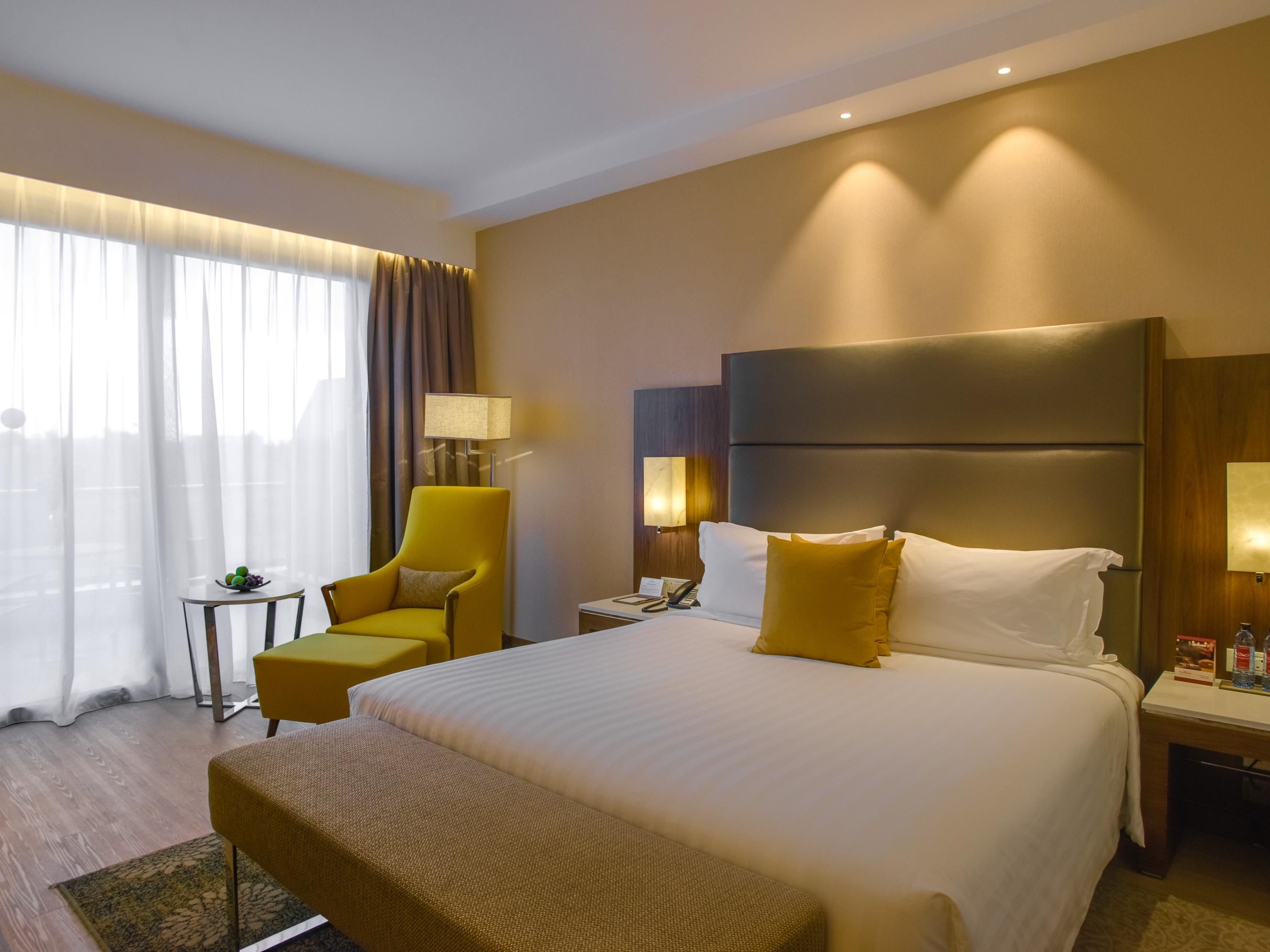 Relax outside in the balcony or on our king size beds.