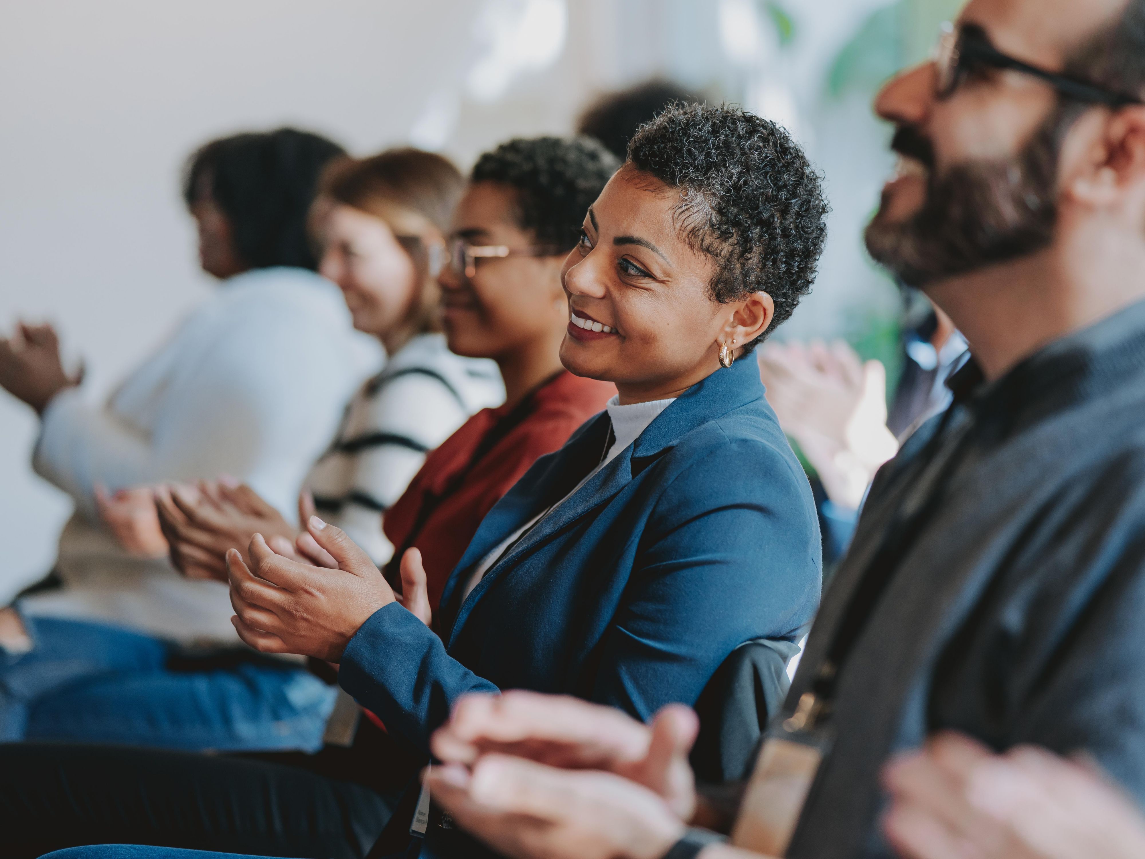 people sitting in a conference room