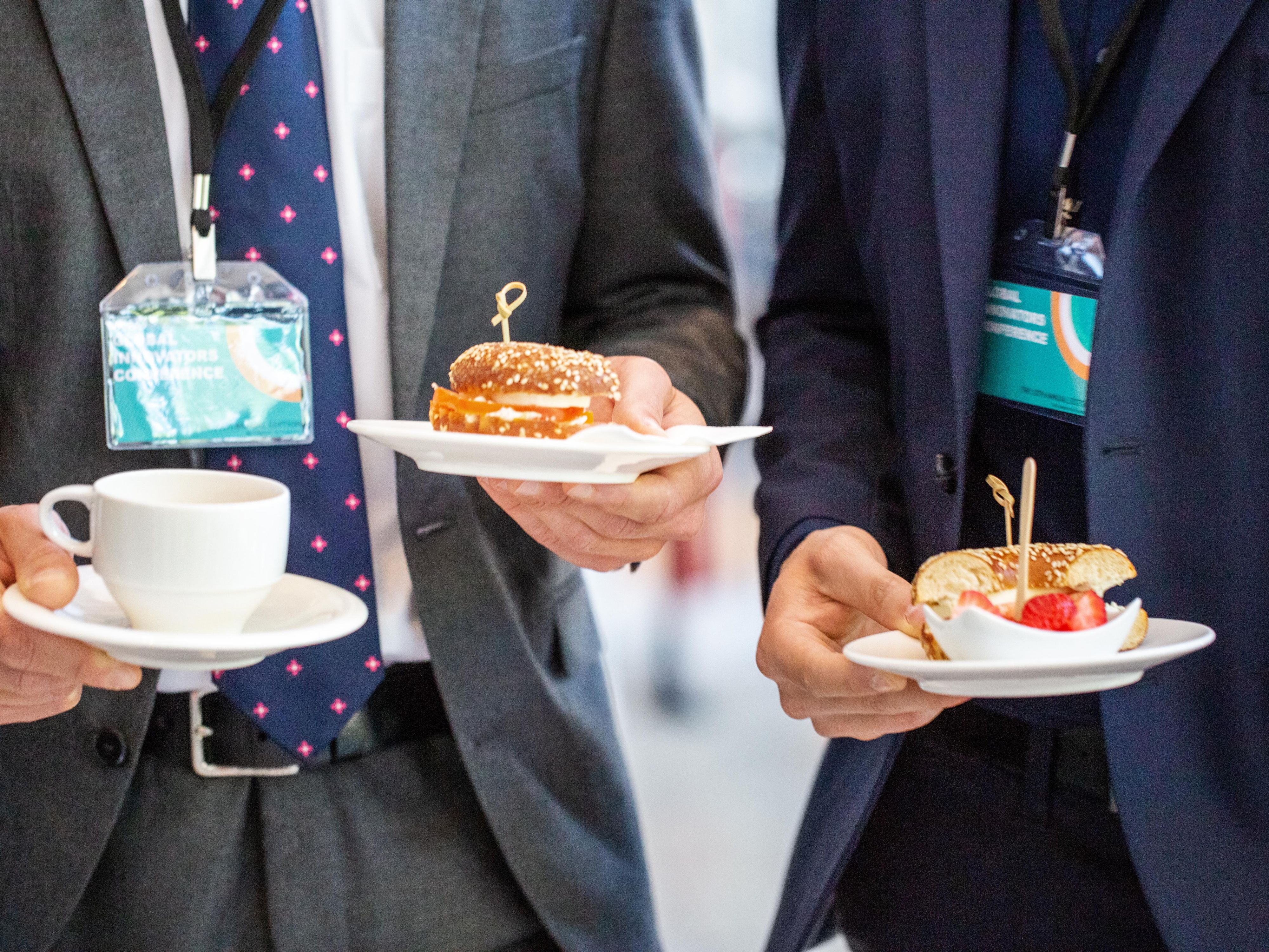 people at a business event with catreing