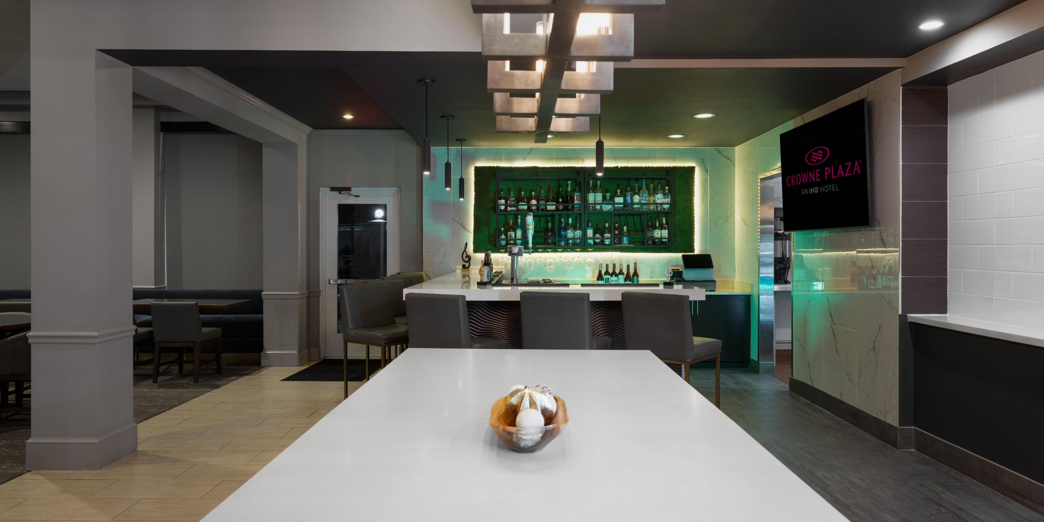 Gather at the bar for cocktails, conversation, and Nashville vibes