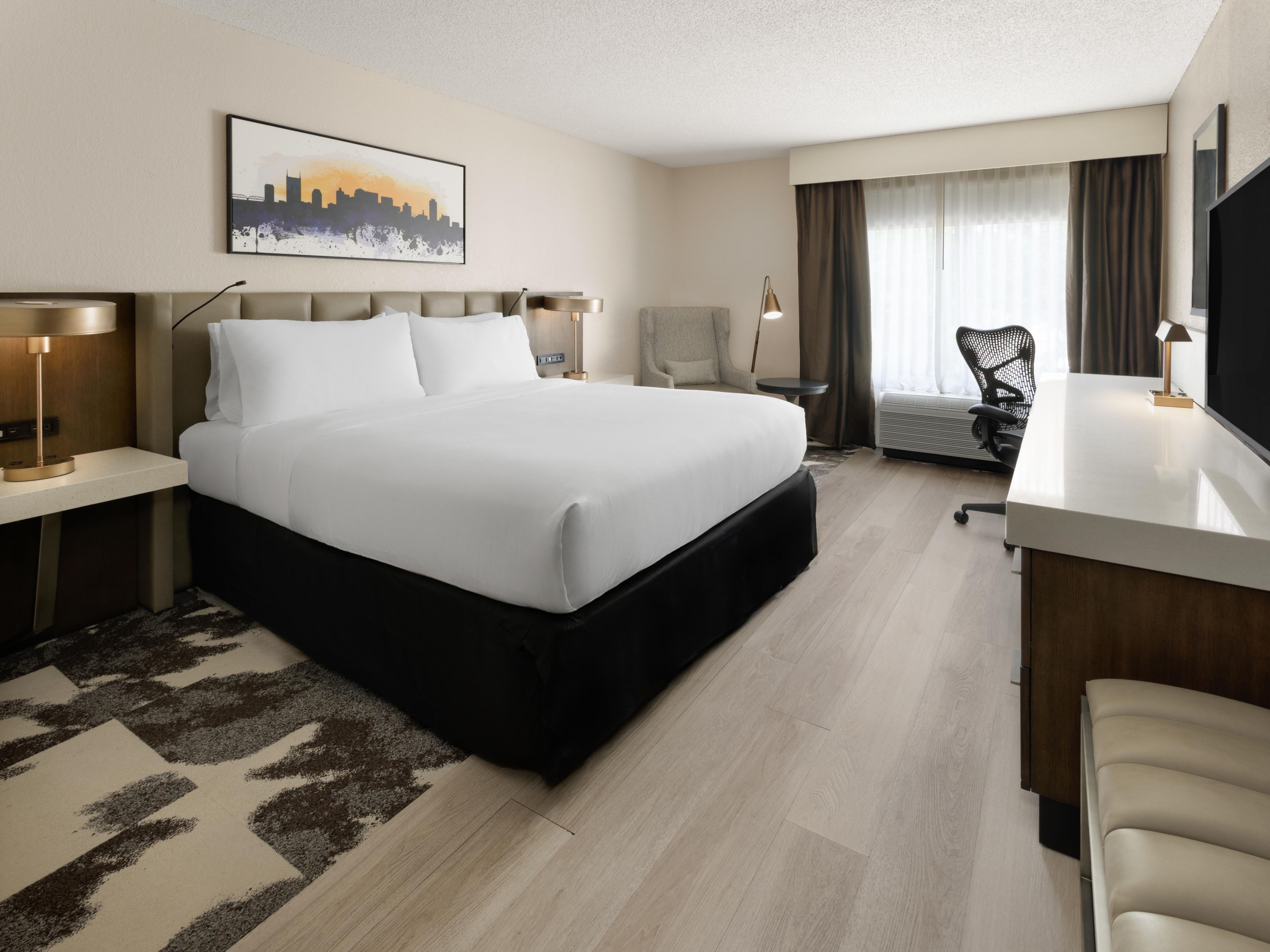 Rest easy in our spacious king room with modern amenities.
