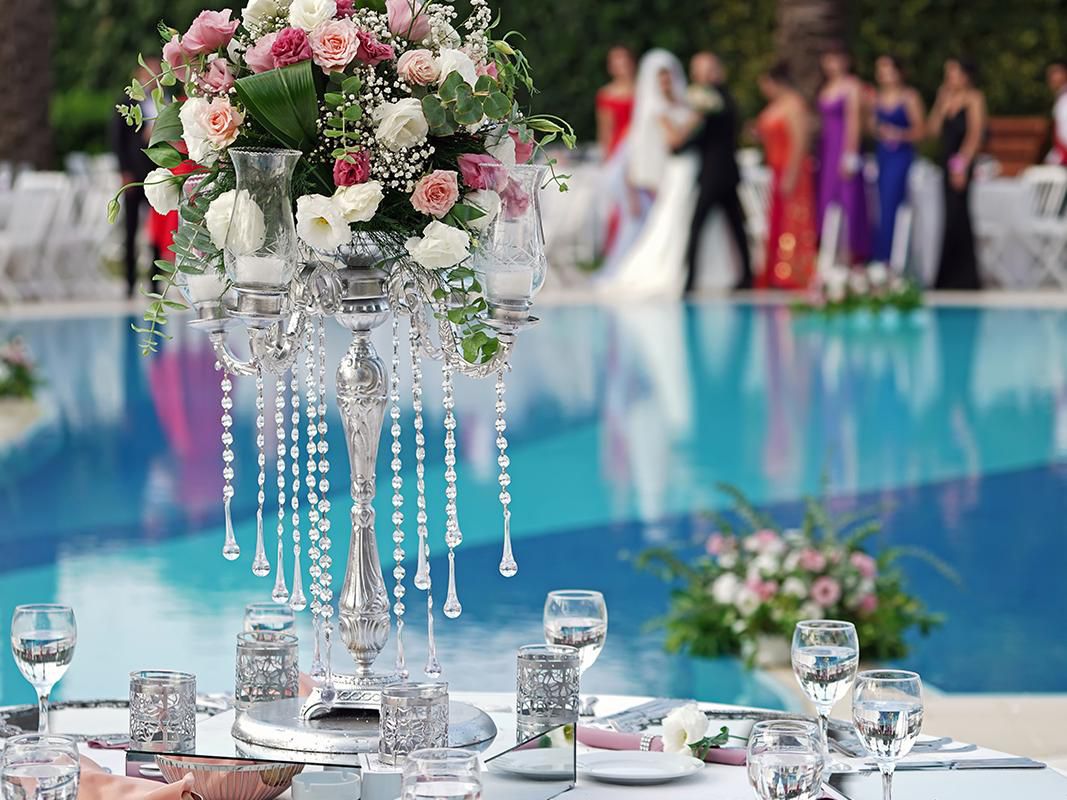 Exchange your vows amidst the picturesque surroundings by the poolside ambience. Add to the experience with a theme-based mandap and mesmerizing decor.
