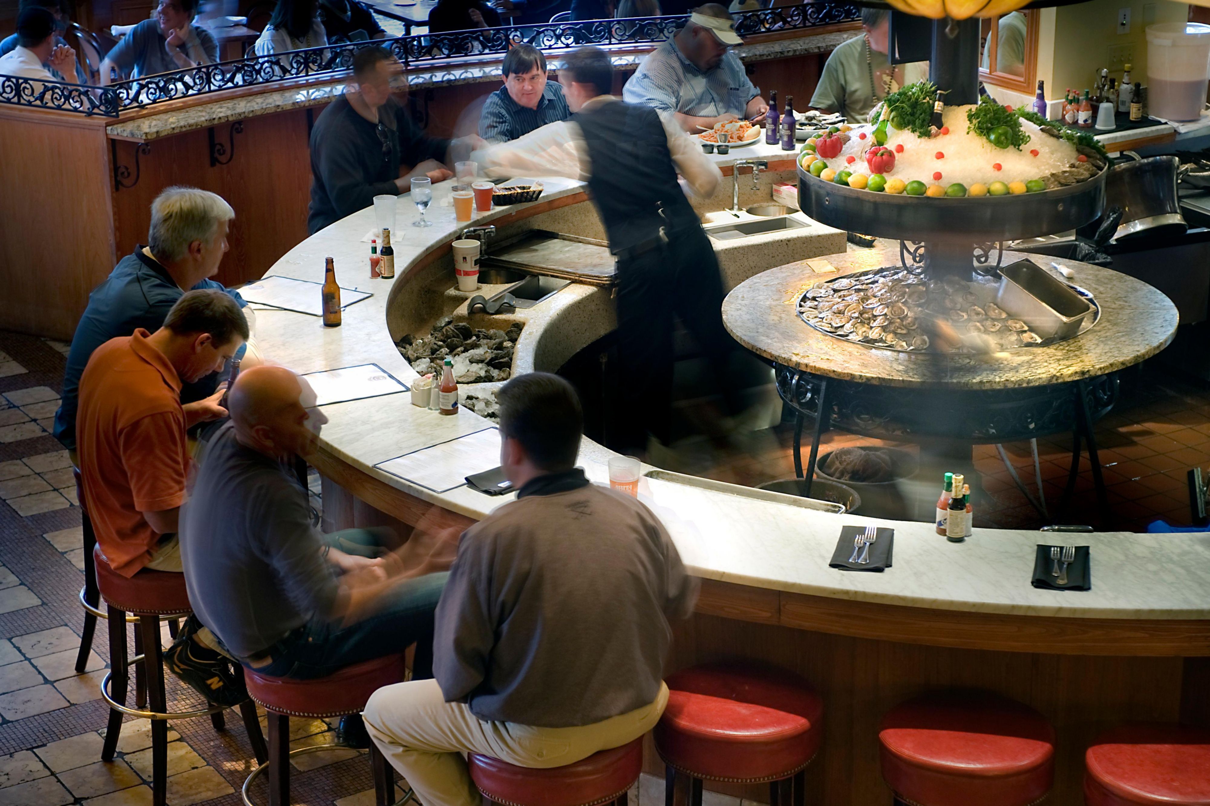 Guests dining at Dickie Brennan’s Bourbon House