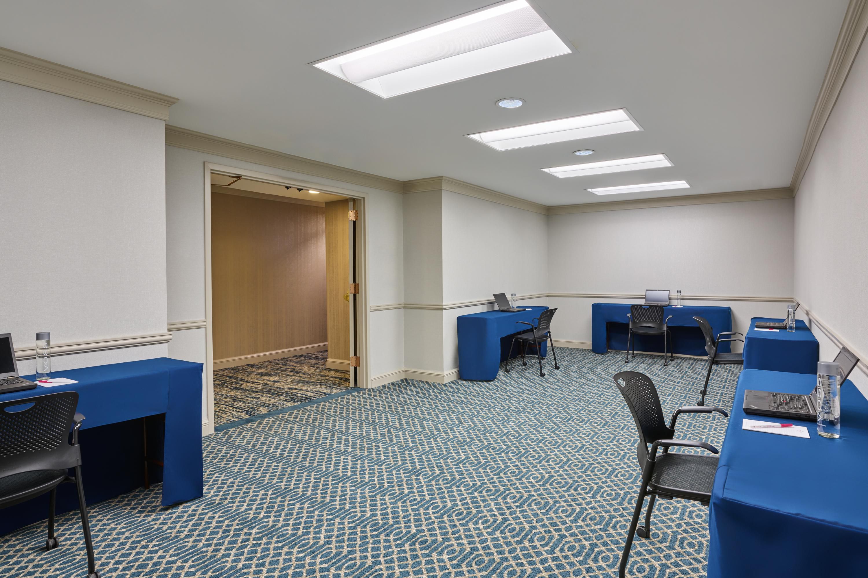Chartes ballroom includes 4 small tables for up to 25 guests