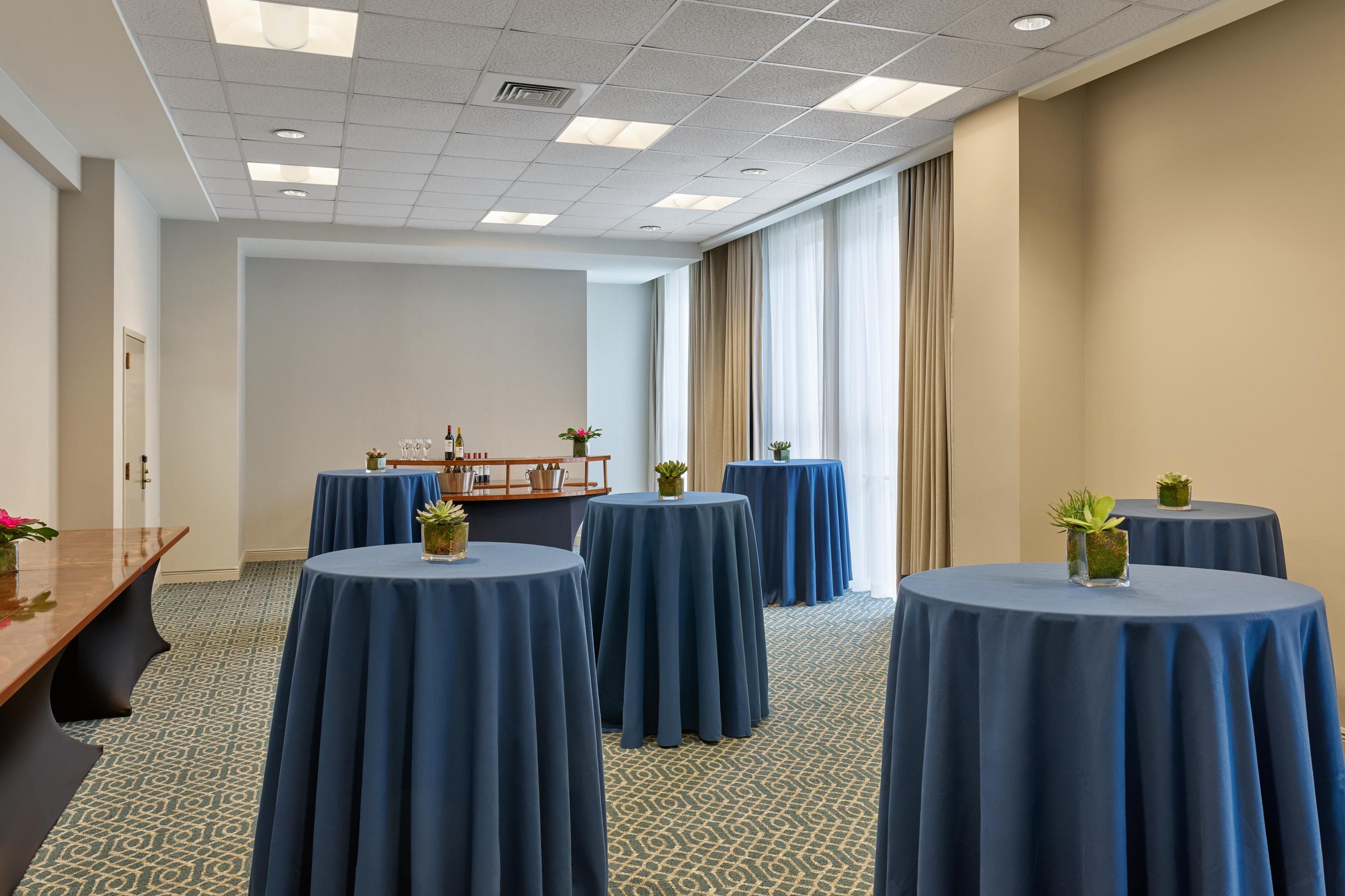 St. Louis with high top tables that is perfect for a reception