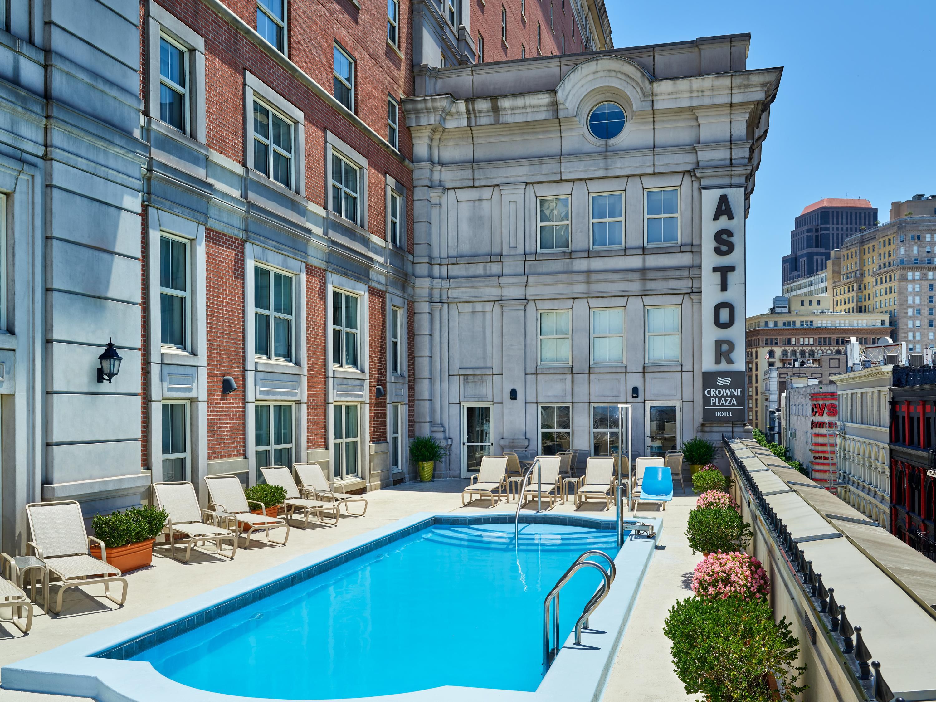 Stay active in our 24/7 Fitness Center, equipped with ellipticals, treadmills, a stair stepper, and free weights—perfect for a workout on your schedule. After a busy day of meetings or exploring the city, unwind with a refreshing swim in our sparkling outdoor pool, the ideal spot to relax and recharge.