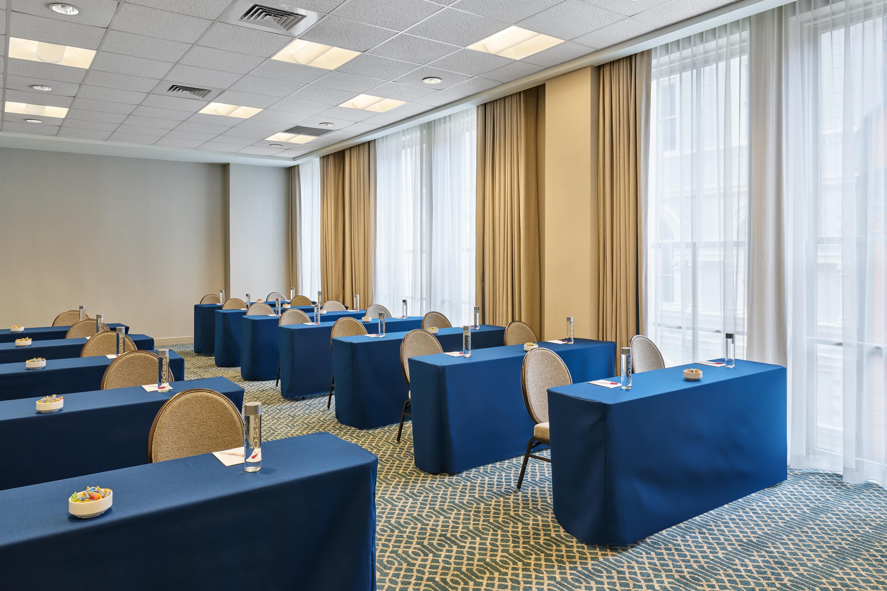 St. Ann meeting room includes small long tables and is perfect for hosting 50 guests