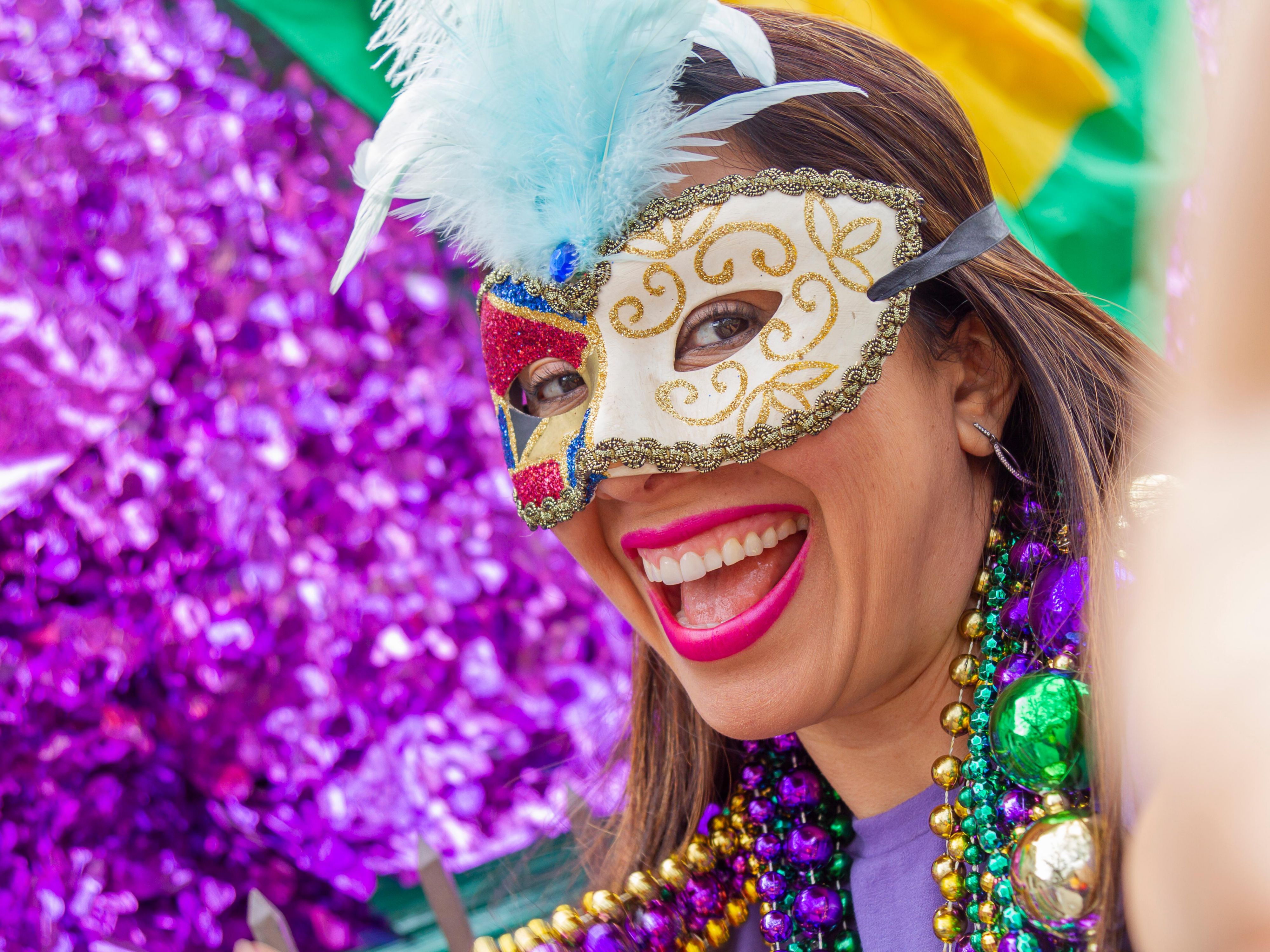 woman dressed up for Mardi Gras