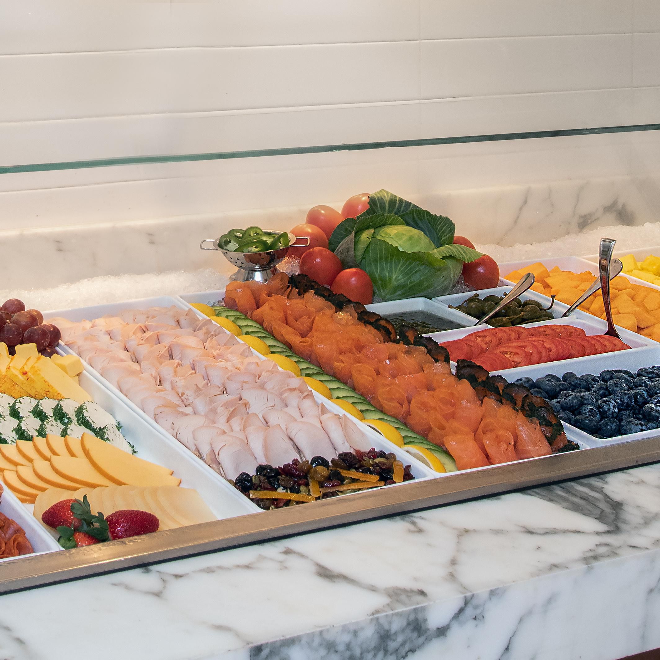Offering fresh fruit, salmon lox &amp; a selection of meats &amp; Cheeses