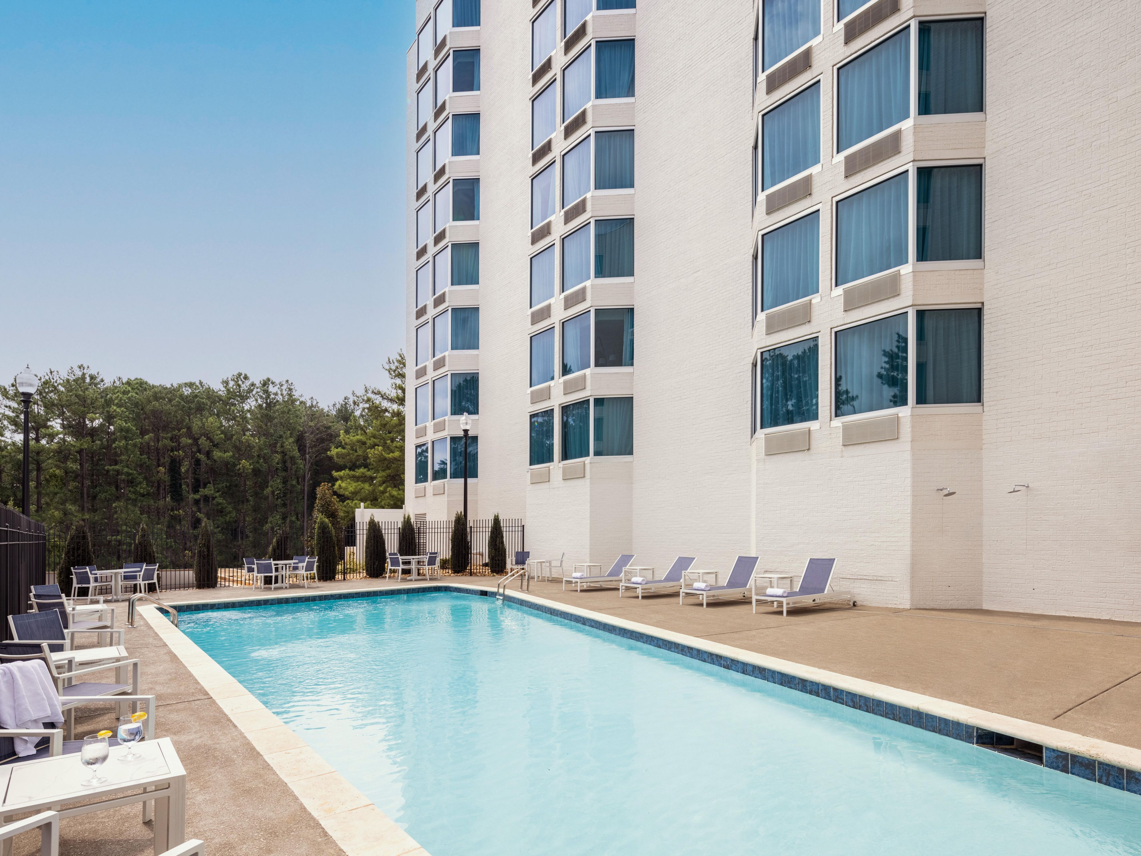 Elevate your stay with a refreshing escape at our seasonal outdoor pool. Whether you're starting your day with a swim or unwinding under the Georgia sun, our pool offers a relaxing retreat designed for comfort, connection, and a touch of indulgence.
