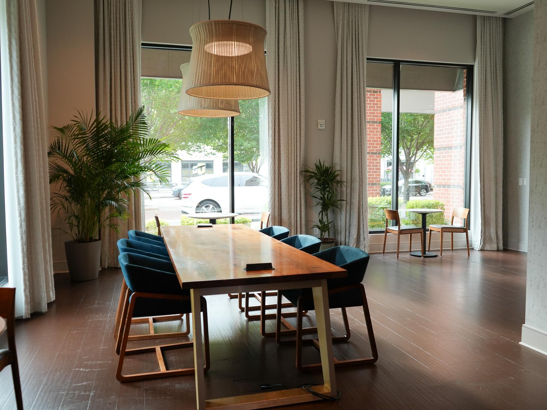 Bright loft workspace with wood table and natural light