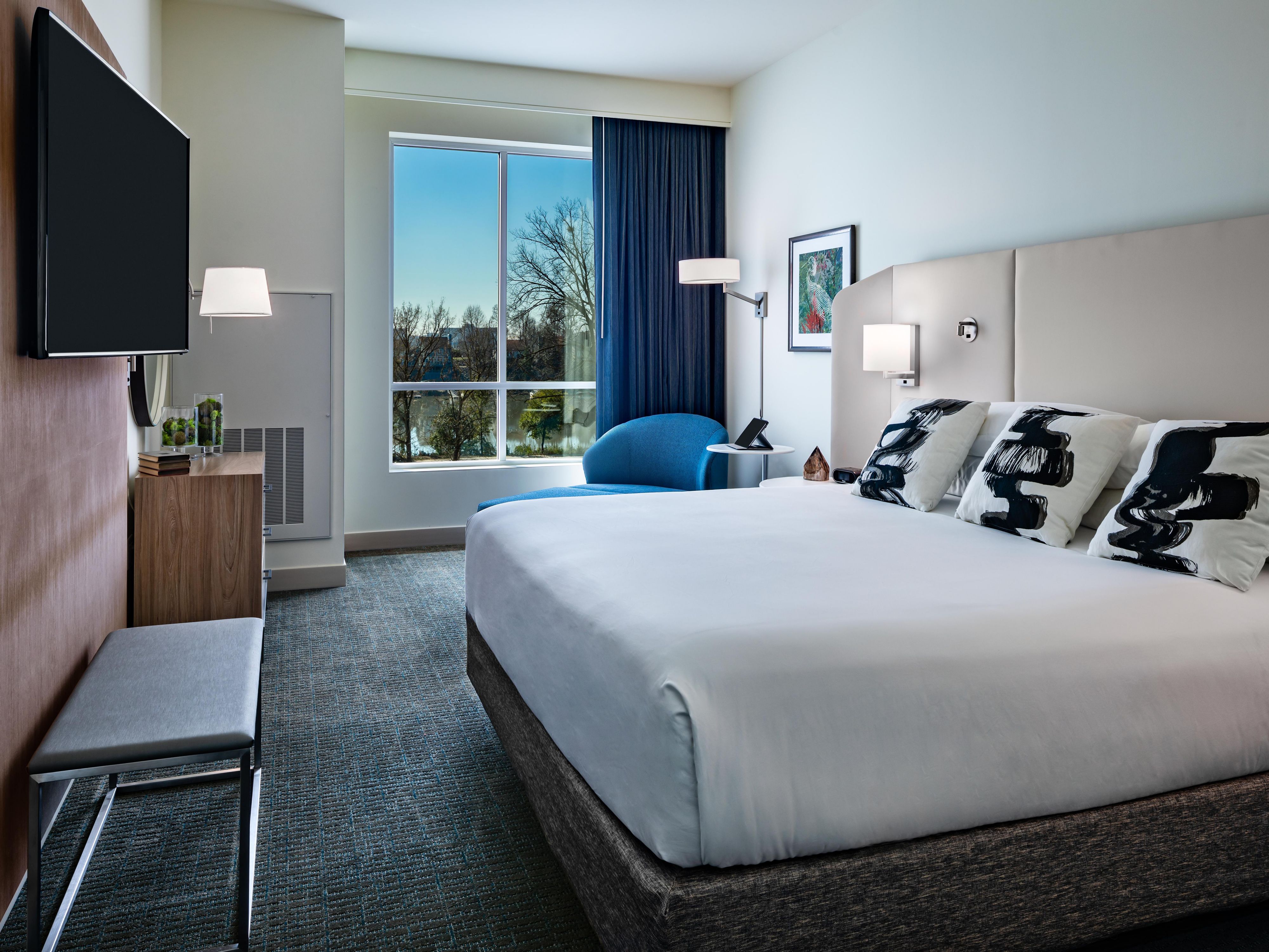 Our hotel provides easy access to the Georgia Cyber Center, offering guests thoughtfully-designed rooms and stunning river views. Each room features beds outfitted with plush bedding and complimentary Wi-Fi. Unwind after visiting Windsor Forest and indulge in a delectable meal at Salt + Marrow Kitchen.​