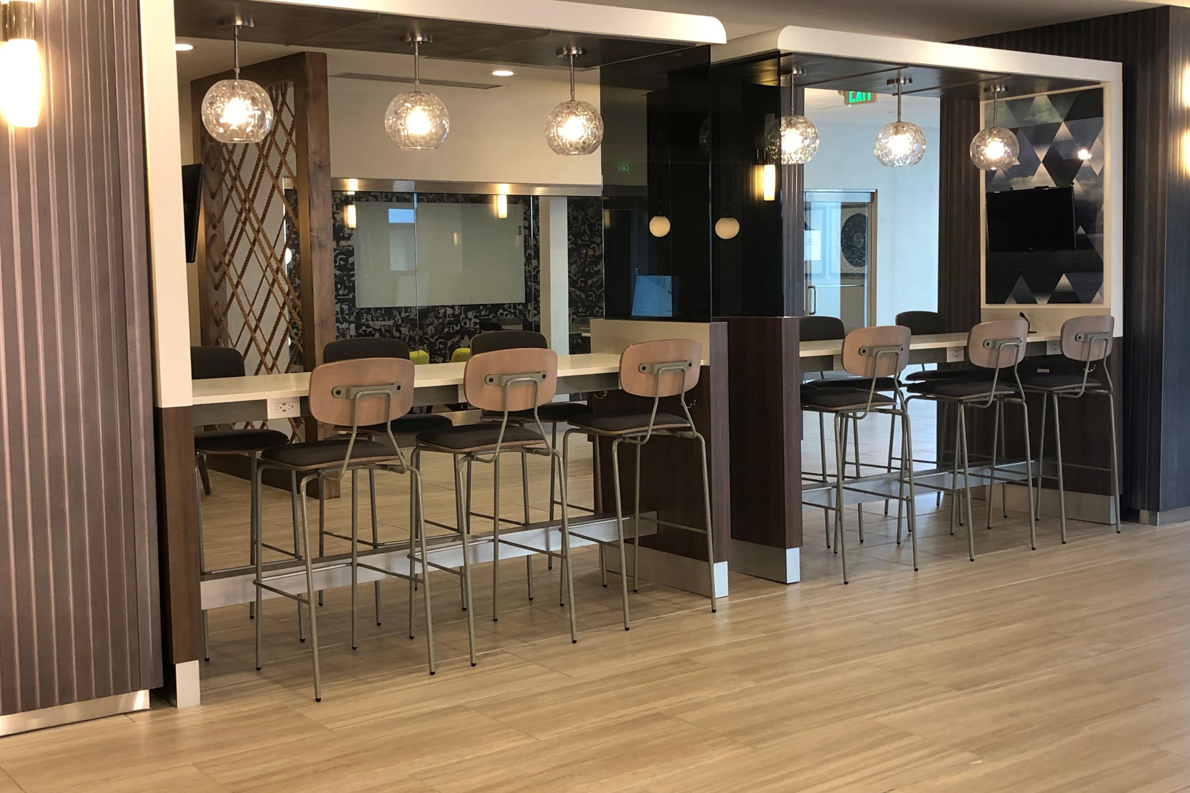 Plaza Workspaces that serve as solo working stations and for team huddles