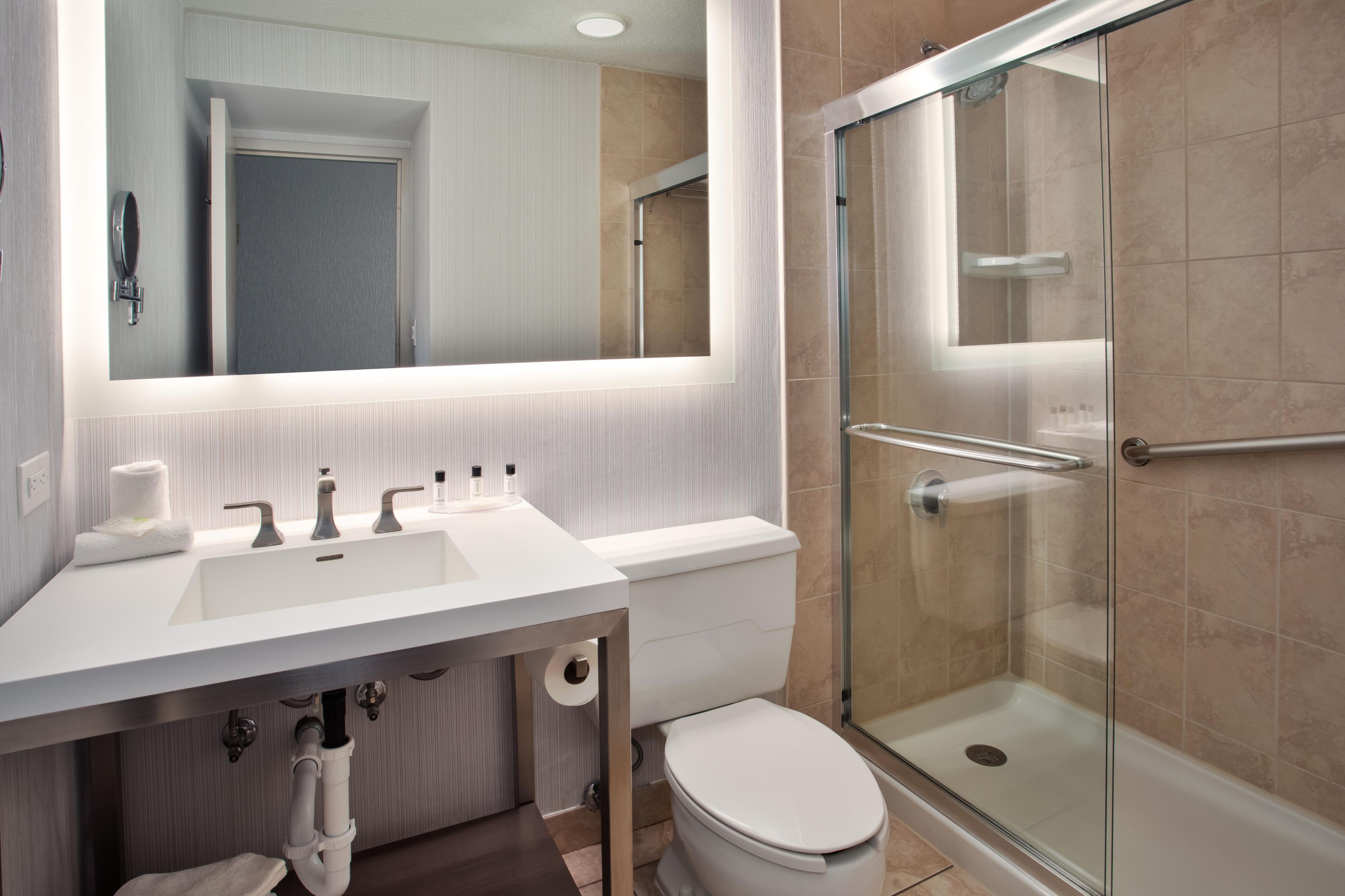 Guest room bathroom with modern amenities