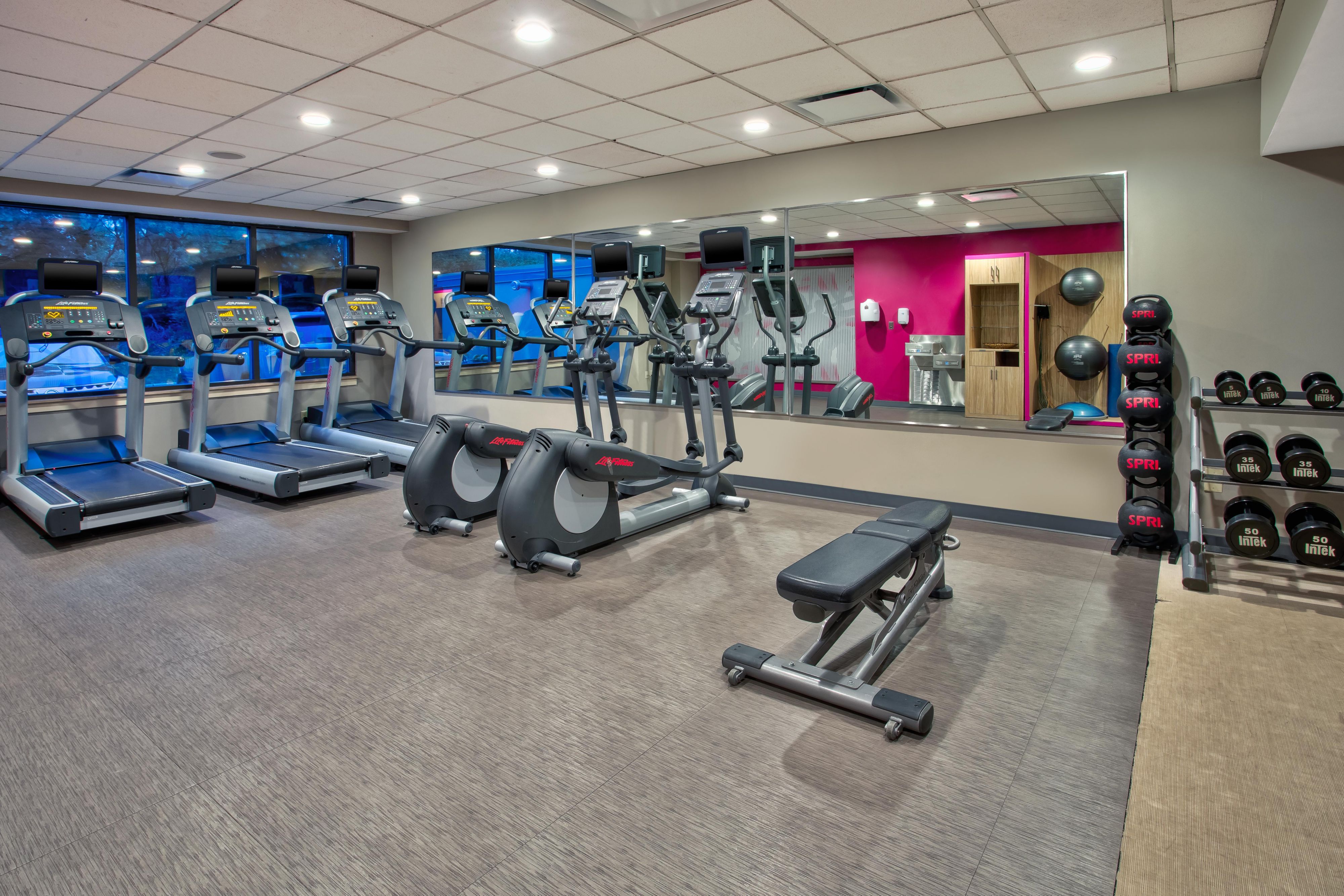 On-Site fitness center with machines and free weights 