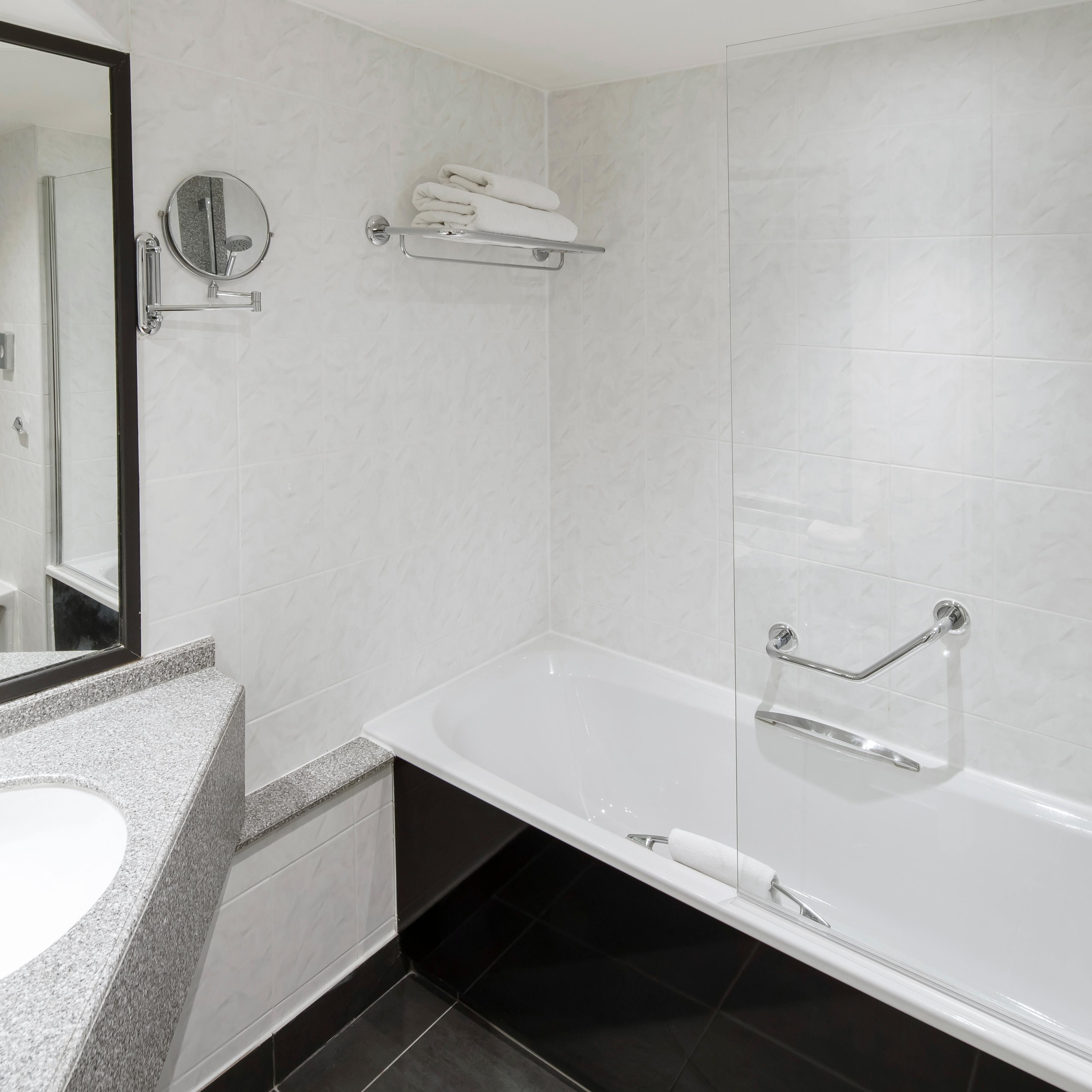 Refresh in a bath or shower in our spacious bathrooms