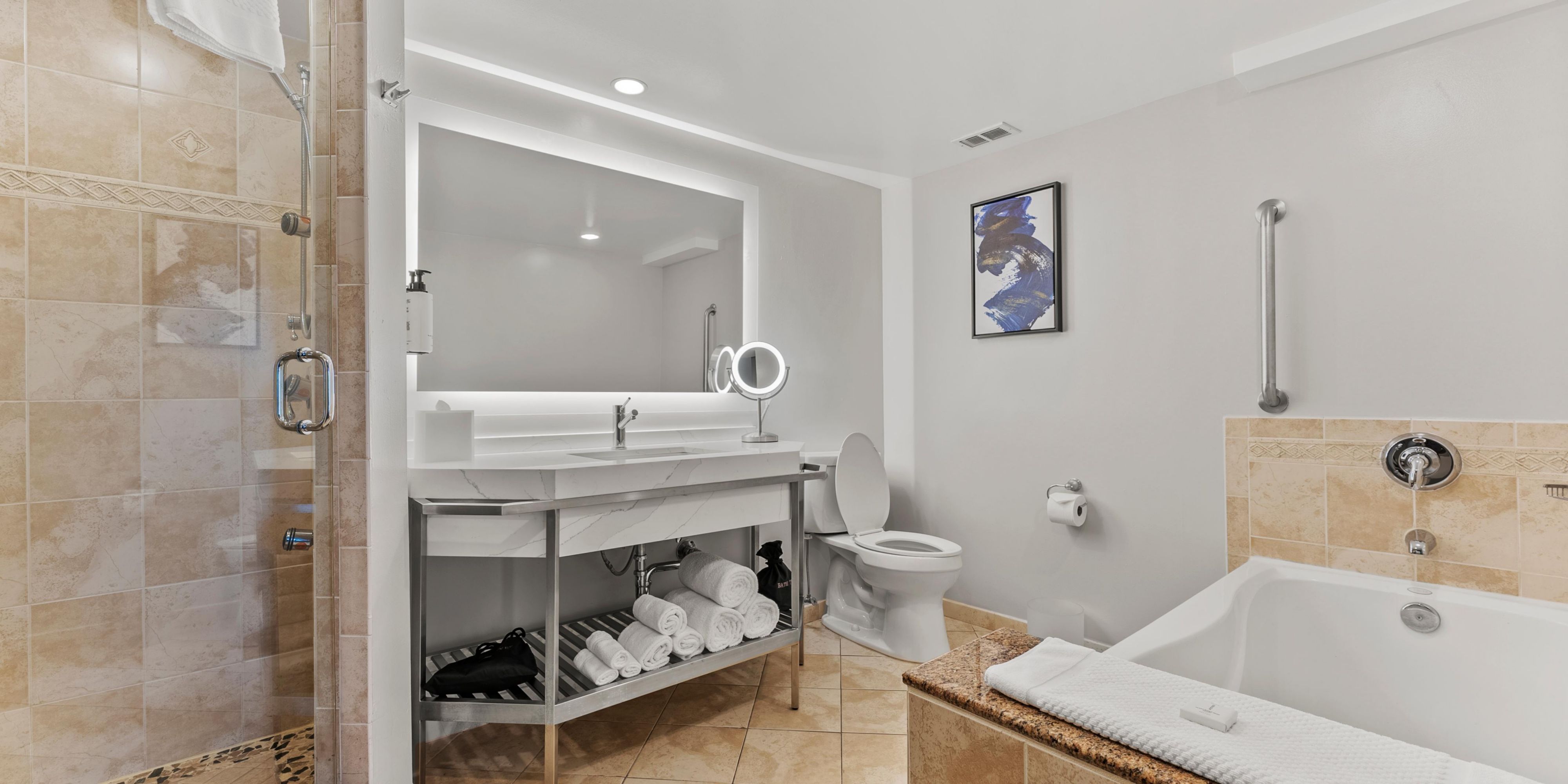 Bathroom with updated vanity and bath tub