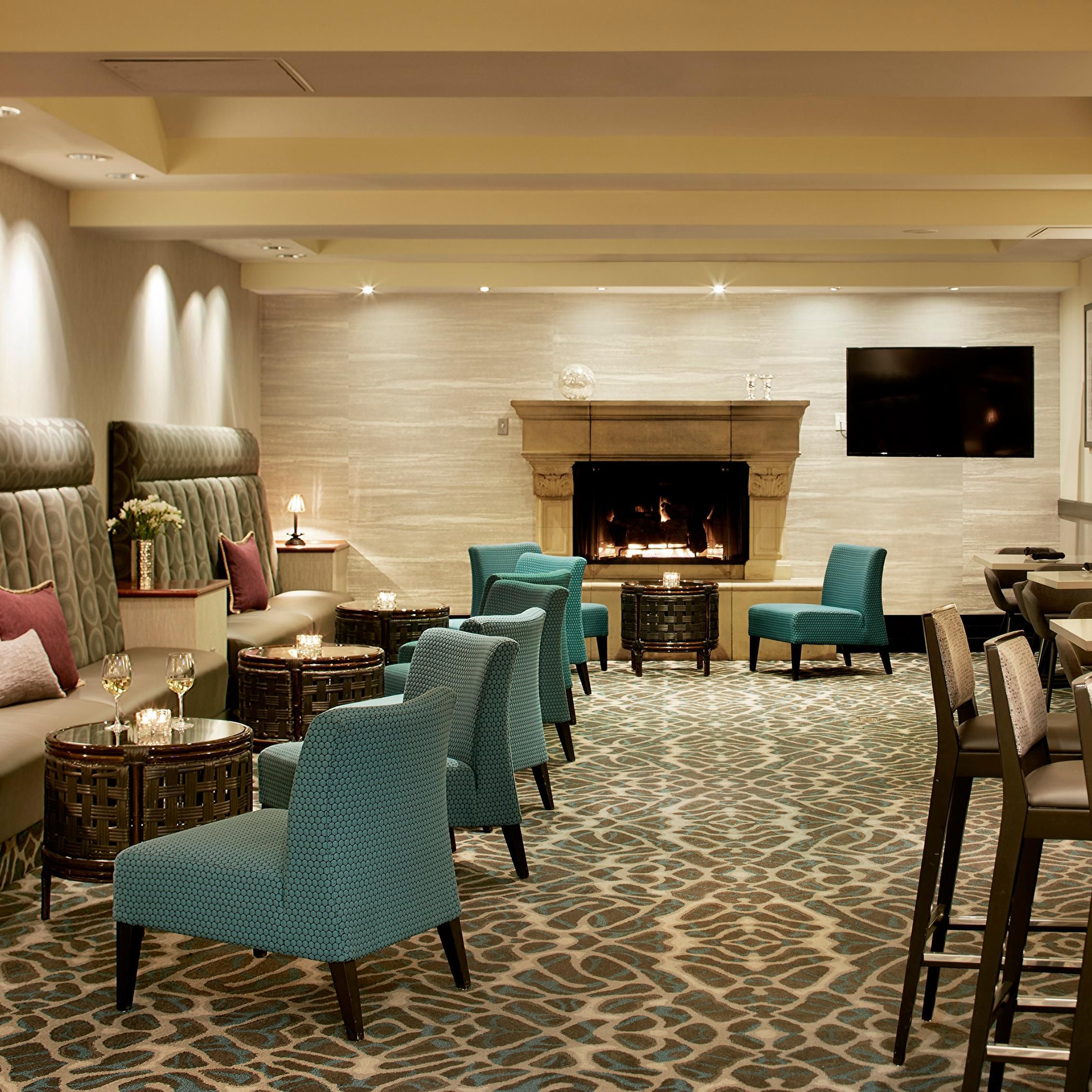 Cozy up next to the fireplace with a cocktail in 4290 Bistro &amp; Bar