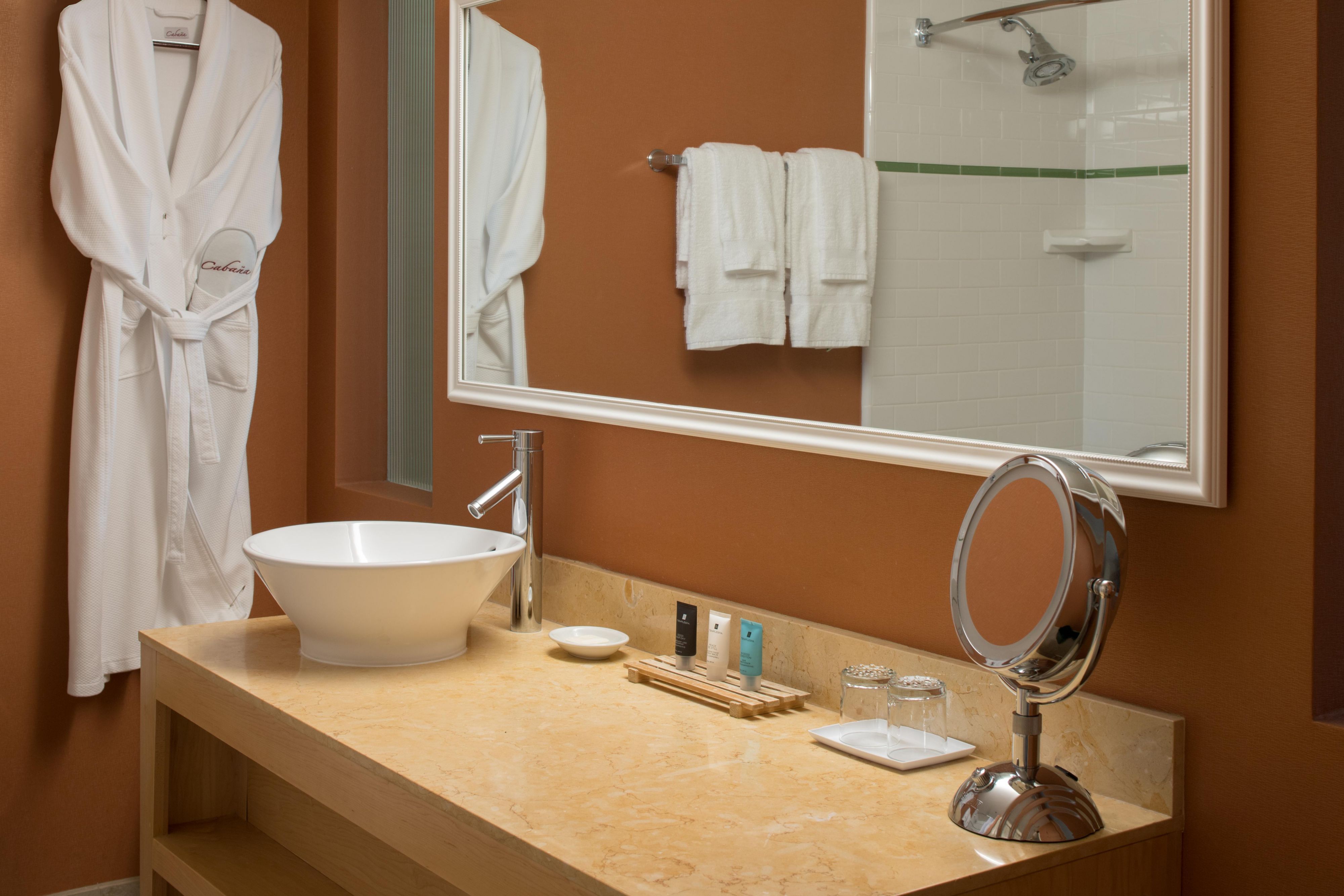 Prepare to soak up the sun in our Poolside Guest Room Bathrooms