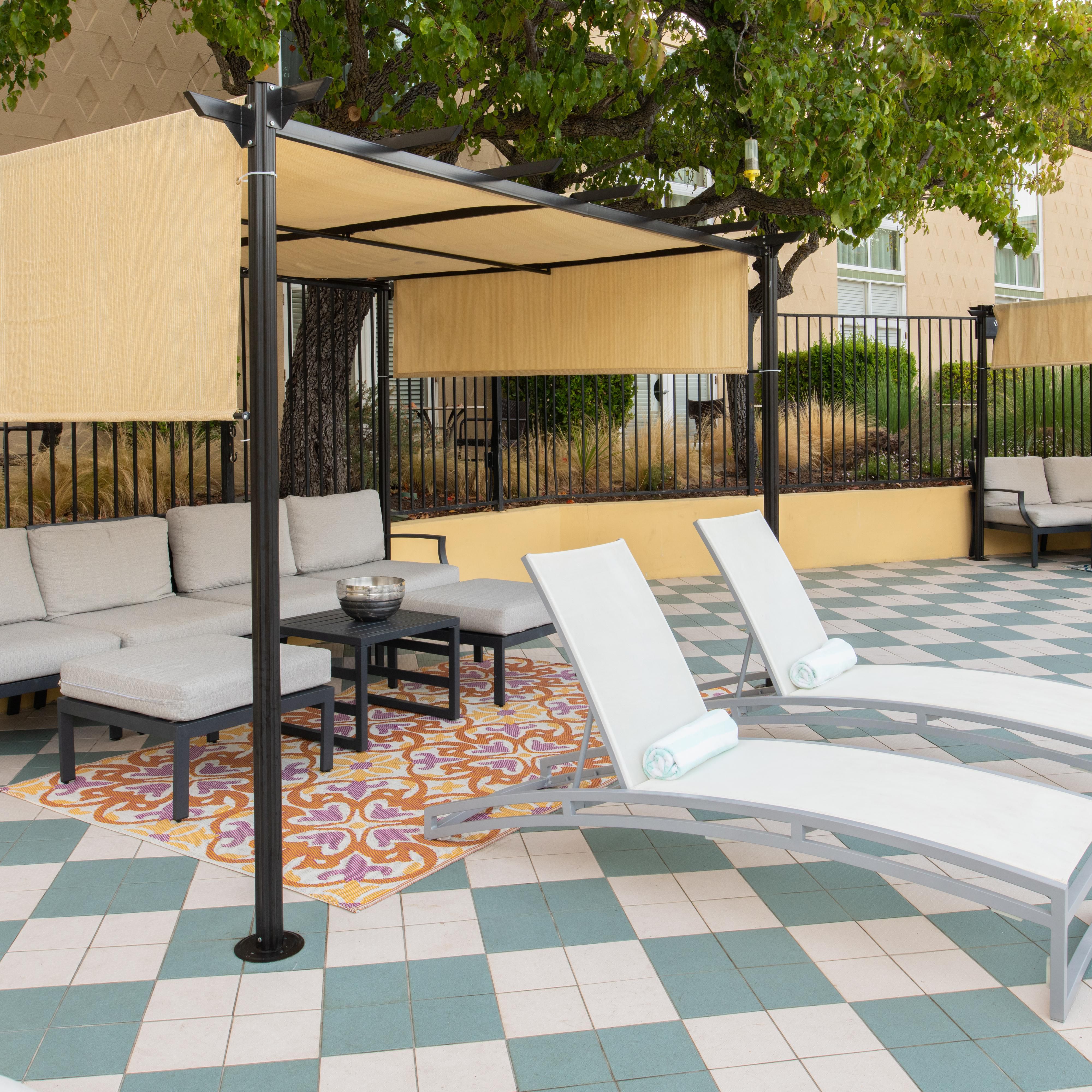 Poolside cabanas available for rent and use.
